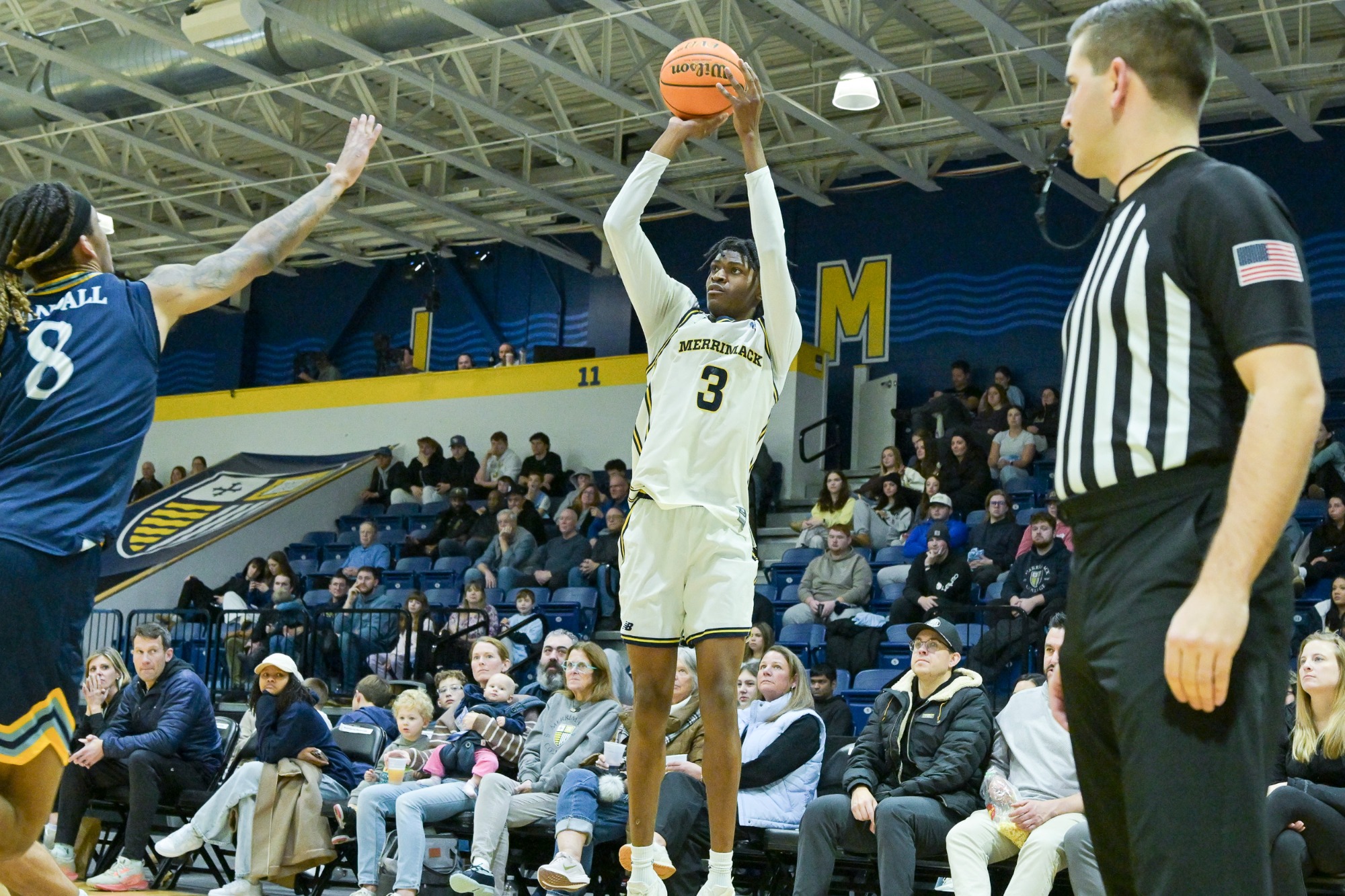 Men's Basketball Tops Quinnipiac