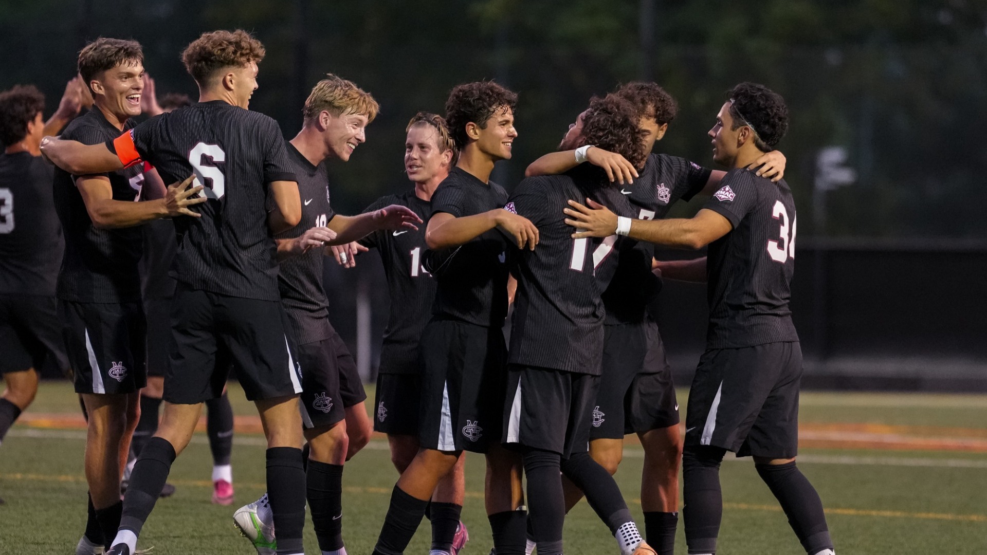 Team Celebrating vs Fort Lewis 