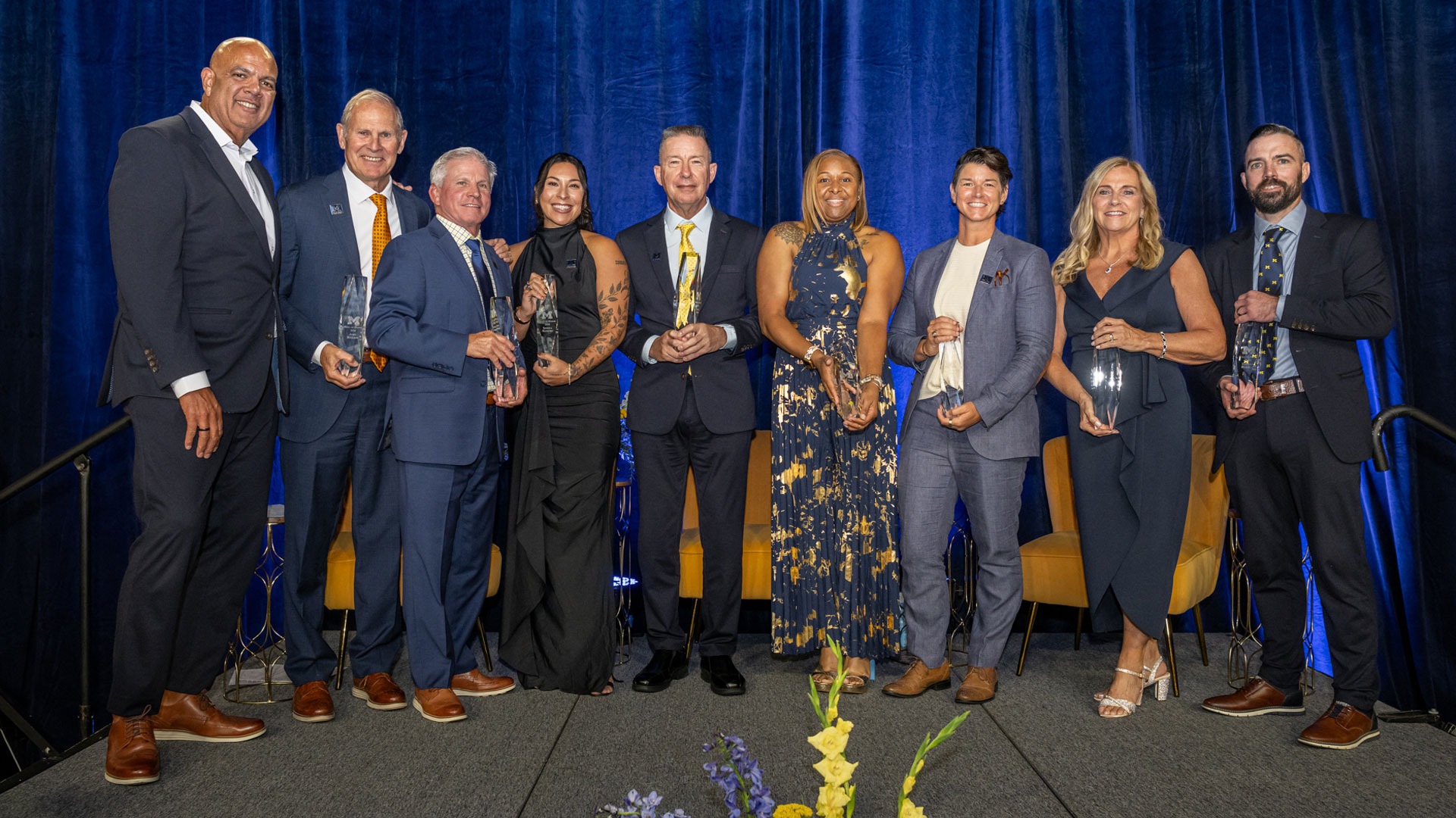 2026 Michigan Athletics Hall of Honor induction class with Donald R. Shepherd Director of Athletics Warde Manuel