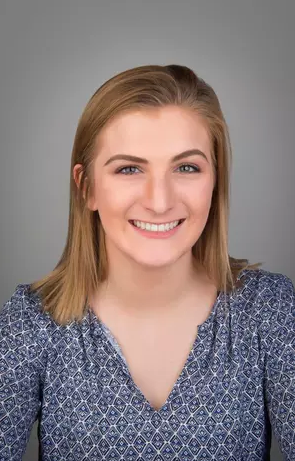 Headshot of Colleen Pritchard in front of a gray background