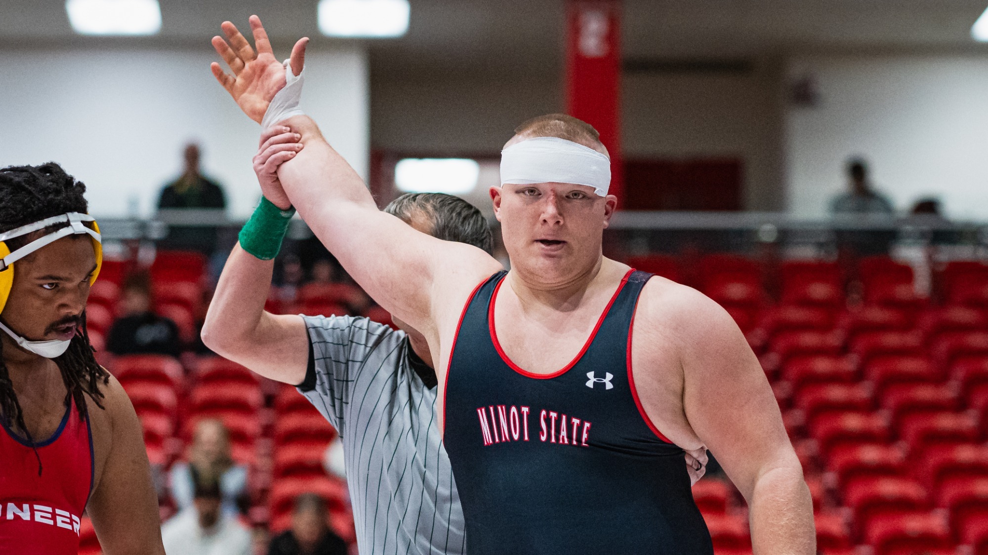 Swirple hand riased in victory