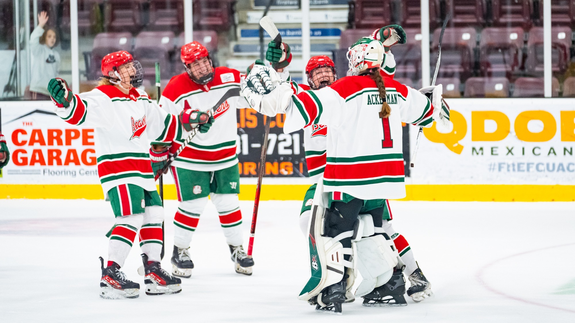 Ackerman celebrates with team