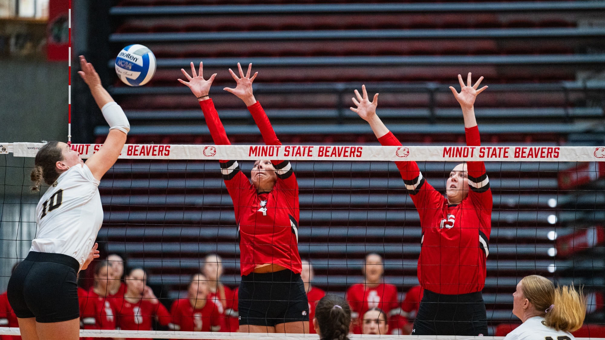 Katelyn Onespot-Danforth and Kiera Hayes blocking against SMSU