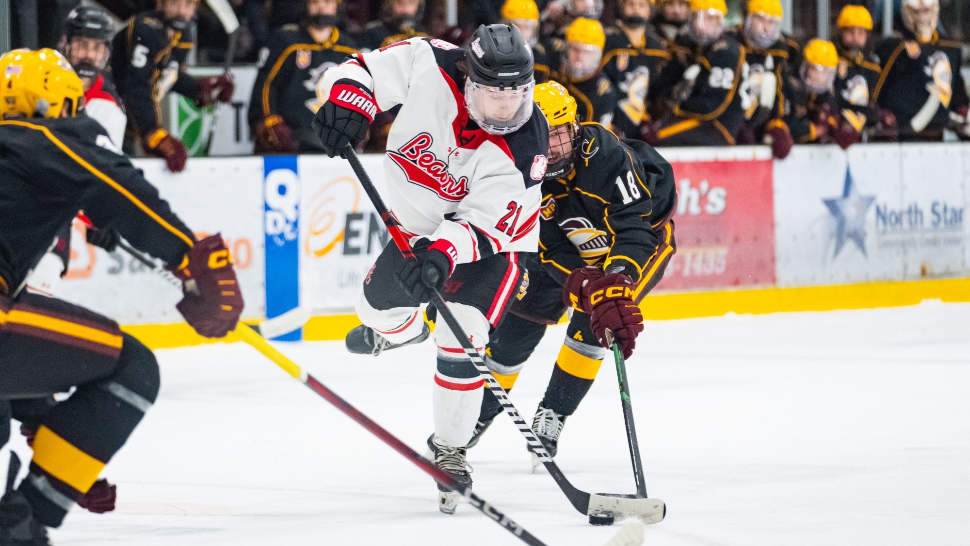 Slade Stanick shoots the puck against Calvin