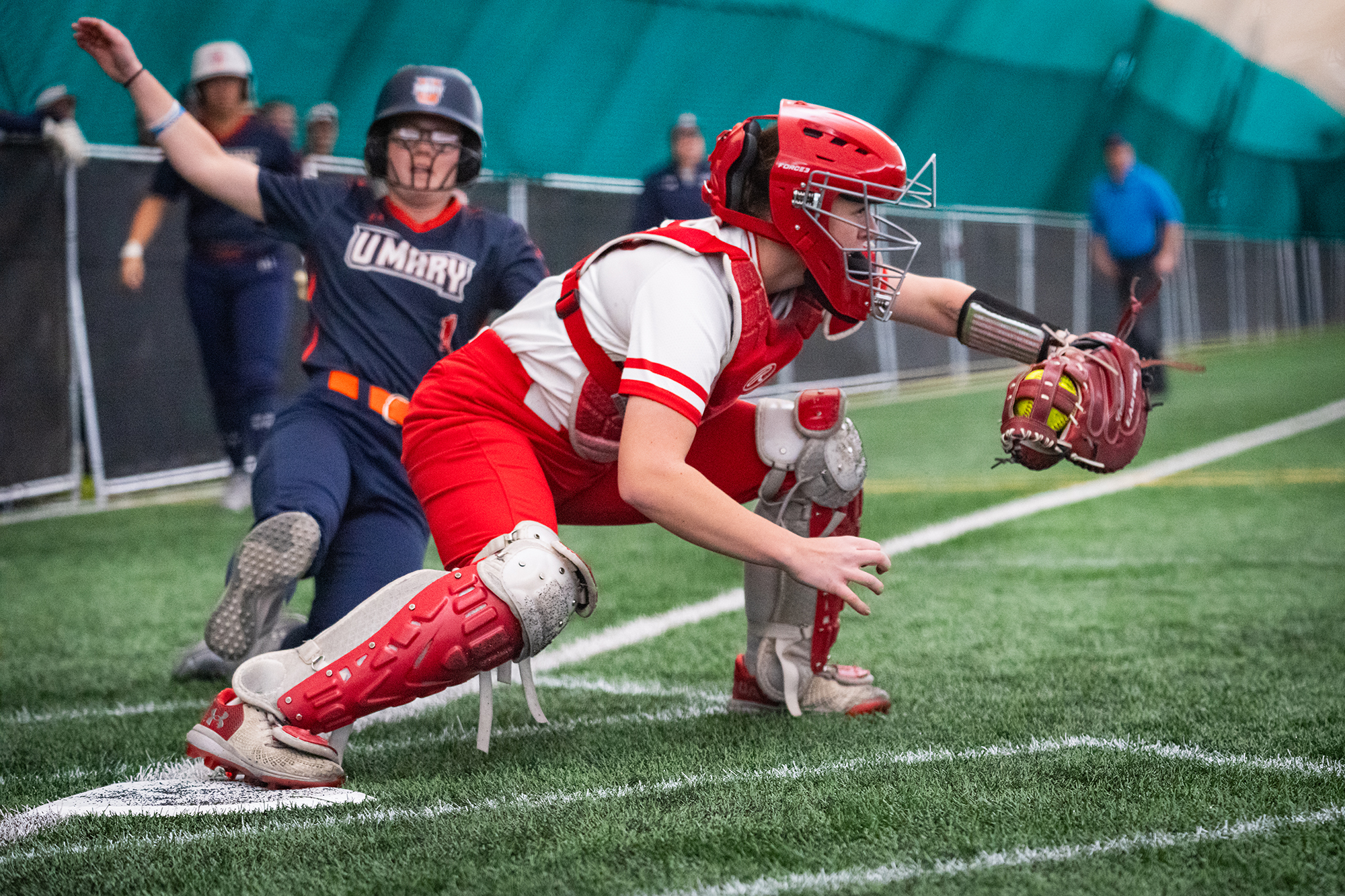 Catcher Anna LaCount gets out