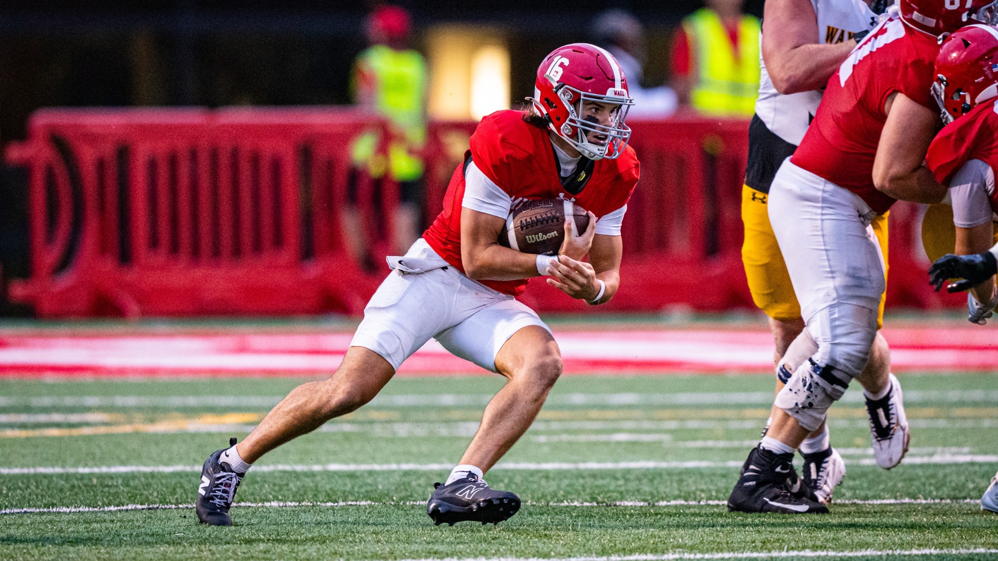 Jett Lundeen runs the ball against Wayne State