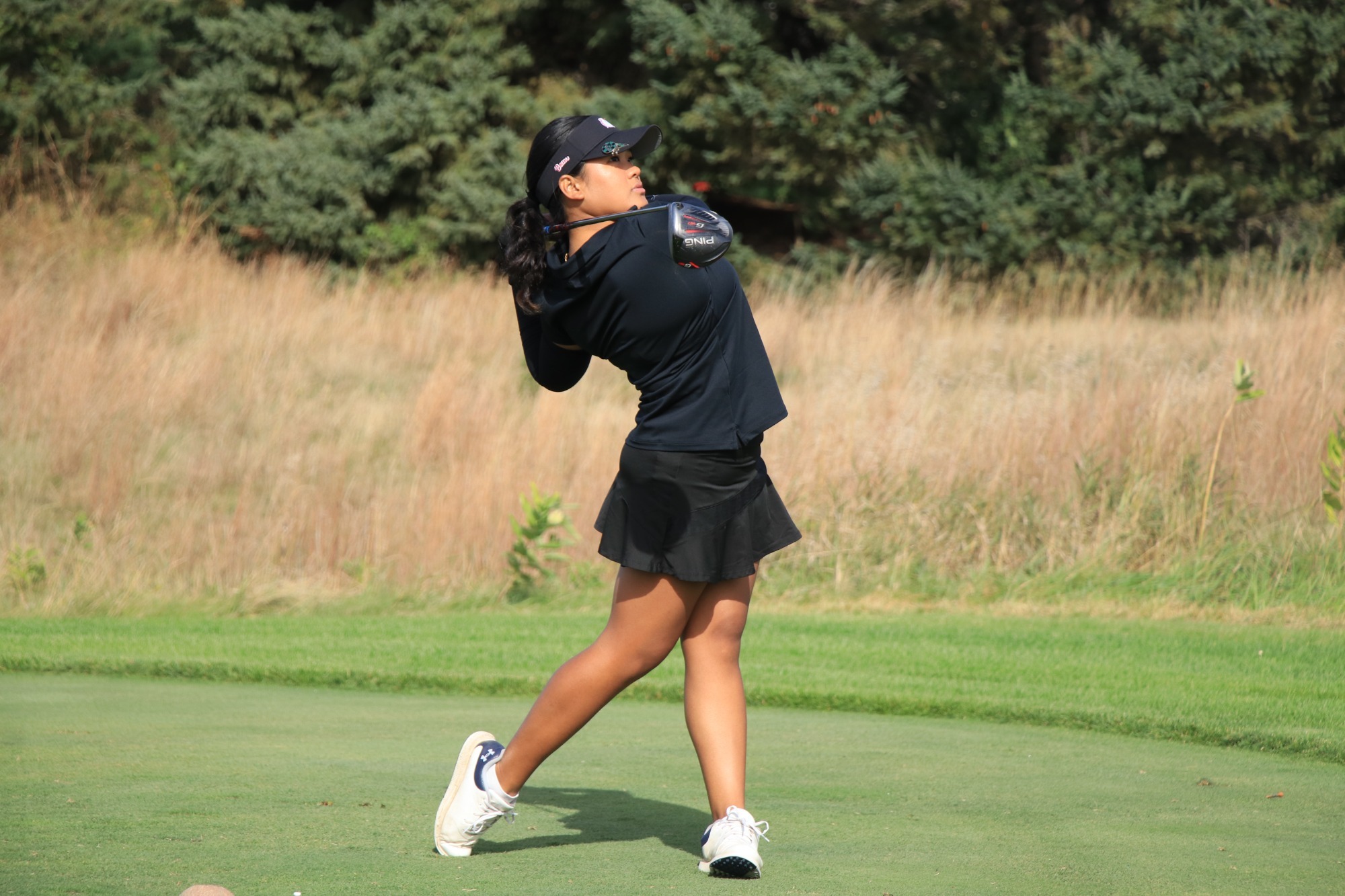 Natalie Van Dort golfing at the MSU/CSP Fall Brawl