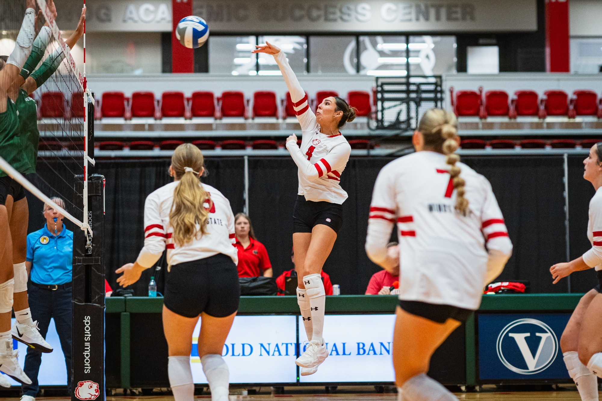 Minot State Volleyball Katelyn Onespot-Danforth spiking ball