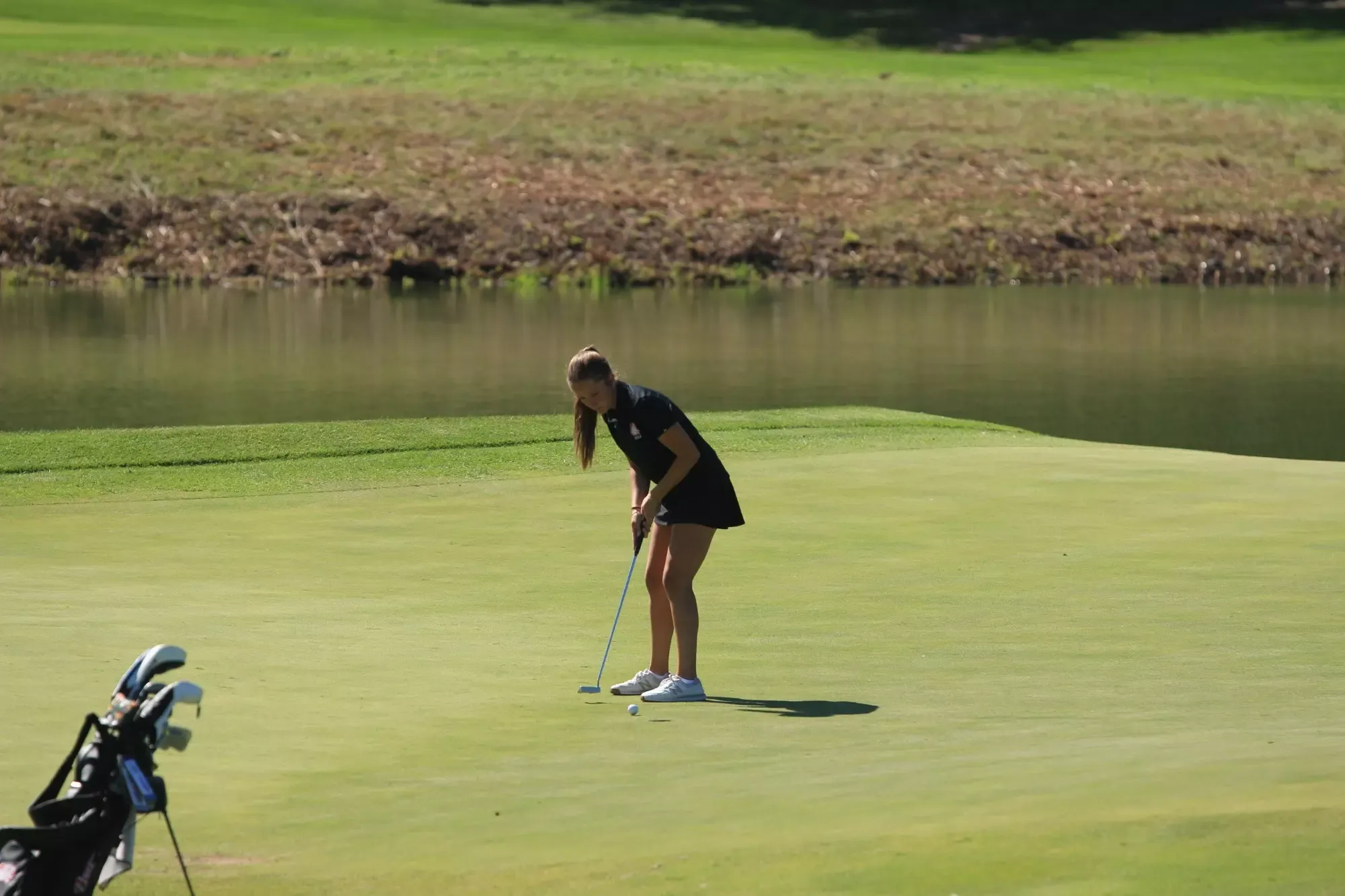 Carlie Brown putts during the MSU/CSP Fall Brawl