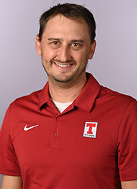 Headshot of Evan Thews-Wassell