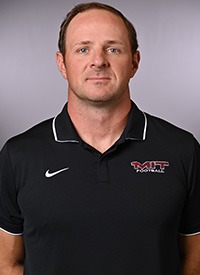 Headshot of Andy Byron
