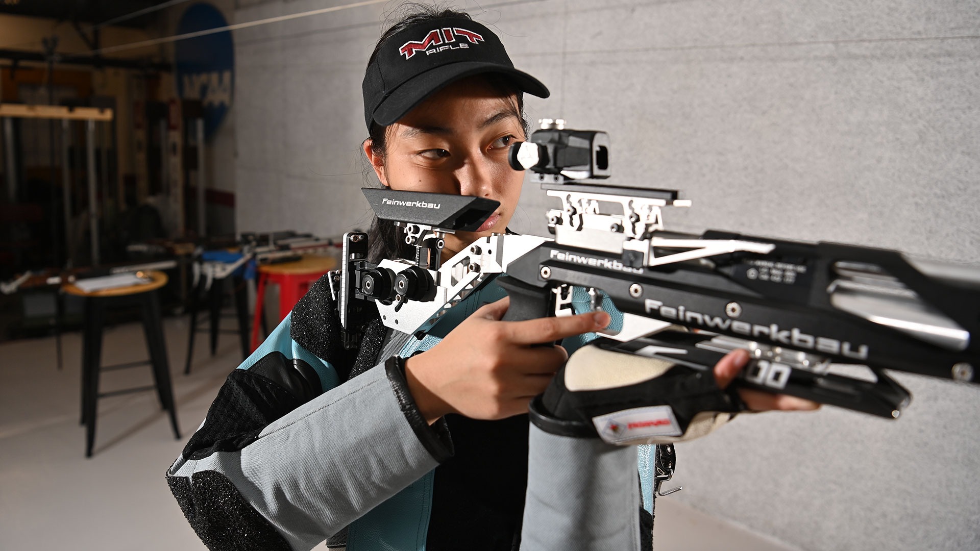 Eleanor Yang aiming her rifle down range