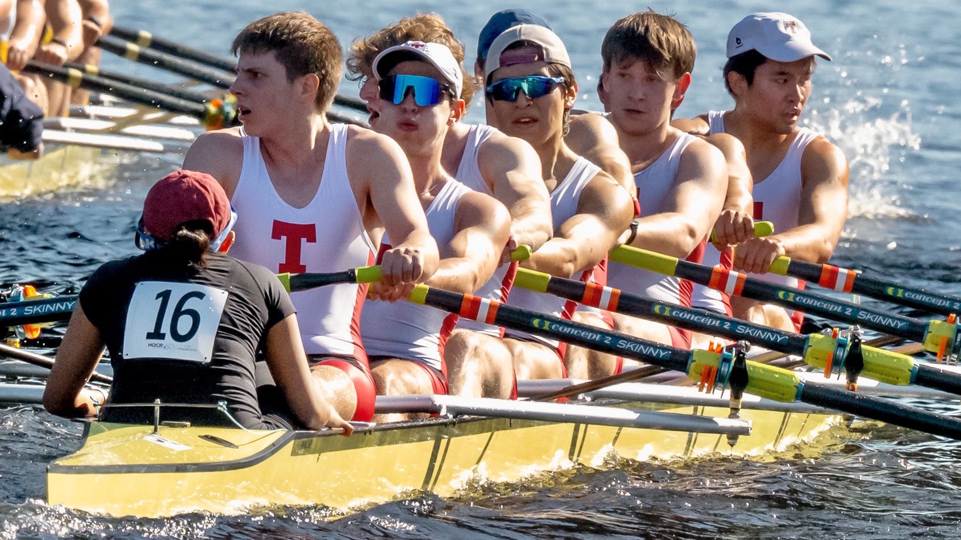 MIT men's heavyweight crew rowing on the Charles River