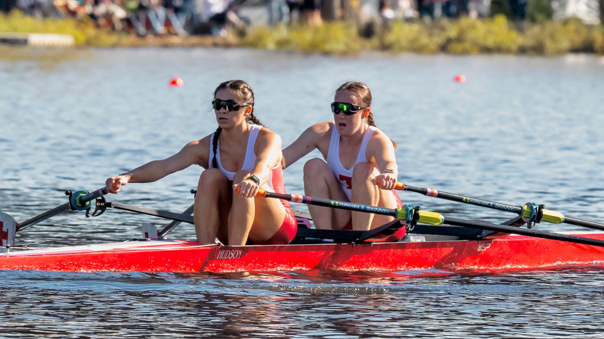 Ava Thigpen and Annabel Noonan rowing for MIT