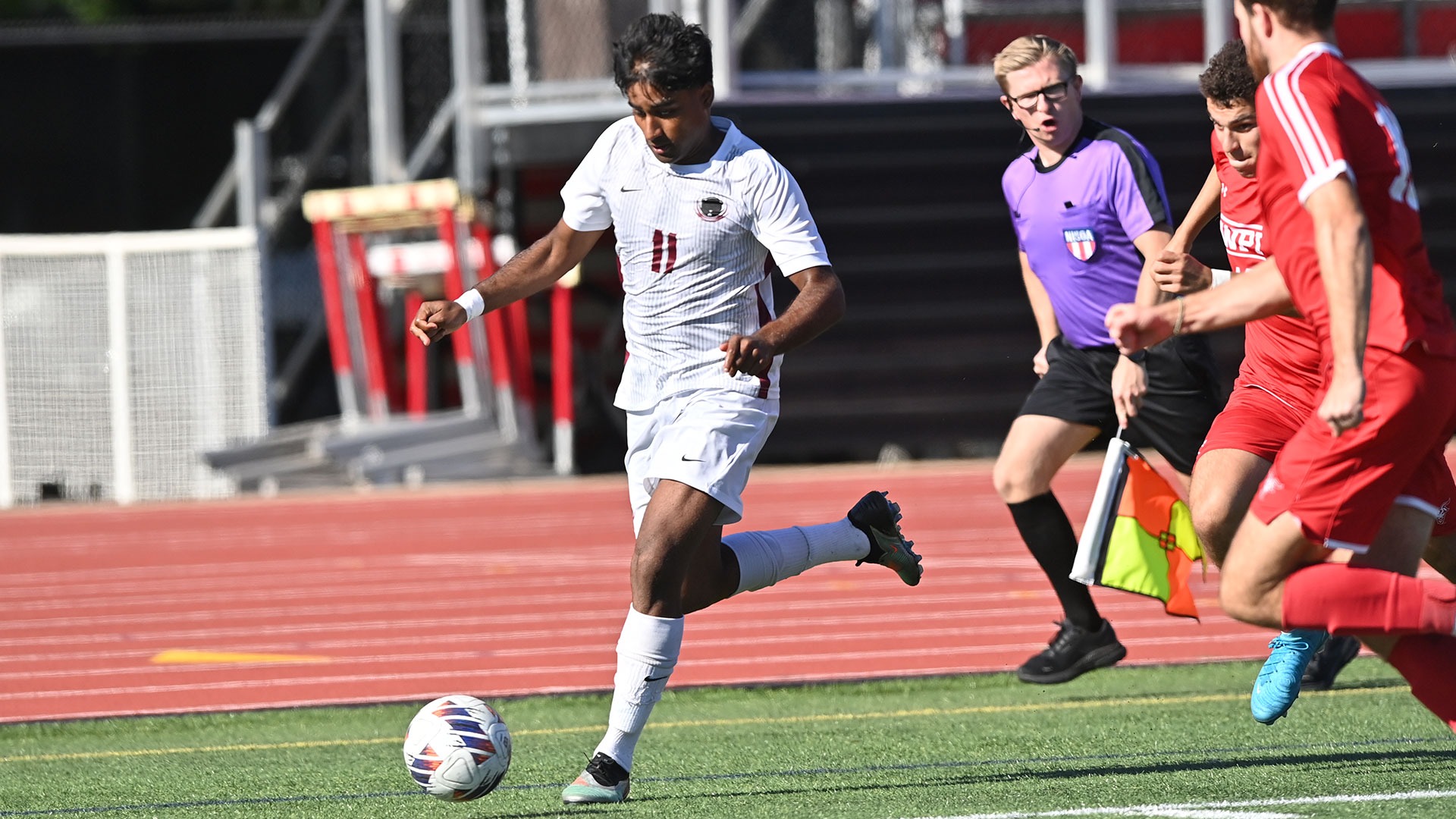 Shikhar Motupally running with the ball