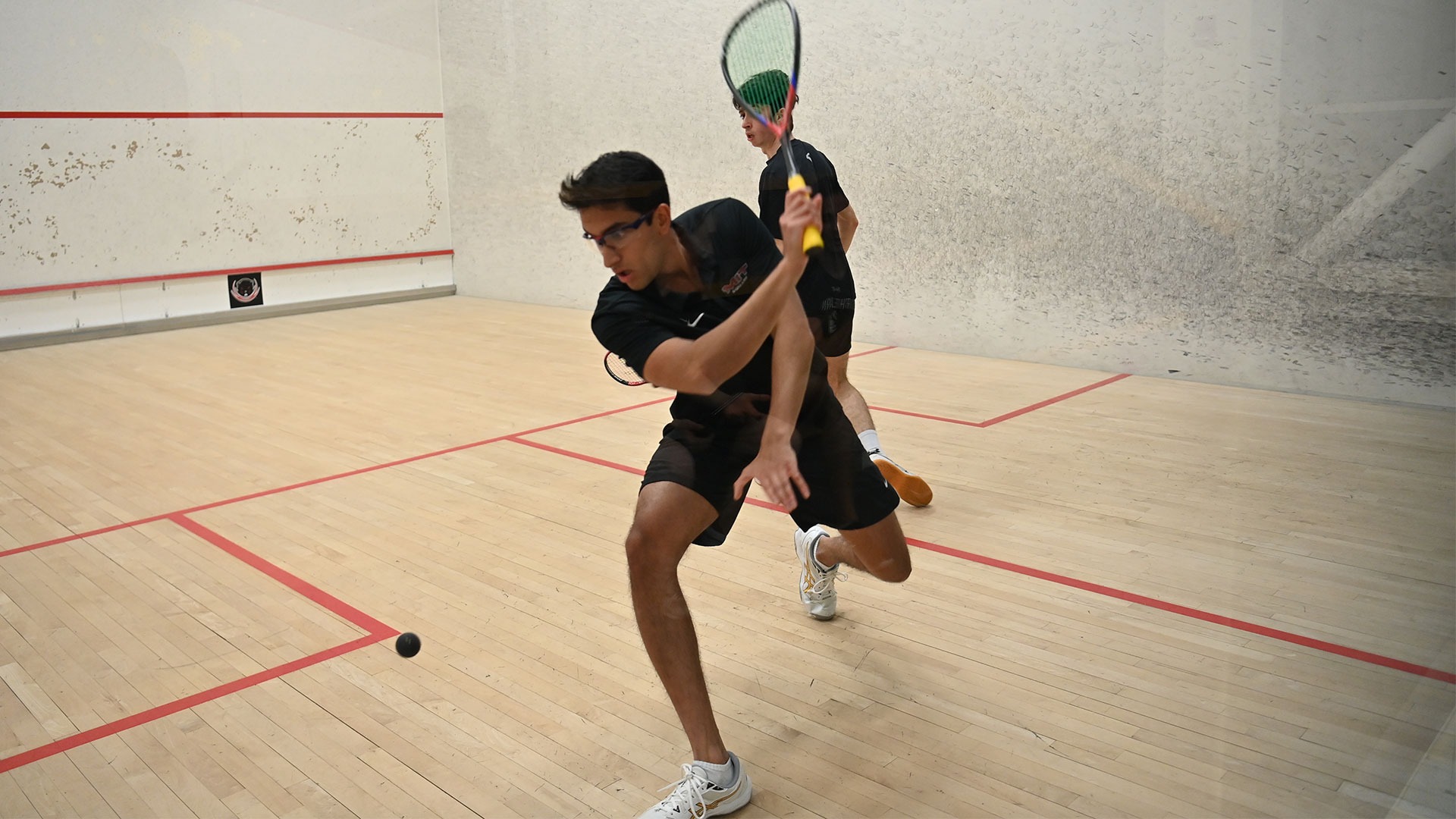 Mitav Nayak hitting a ball