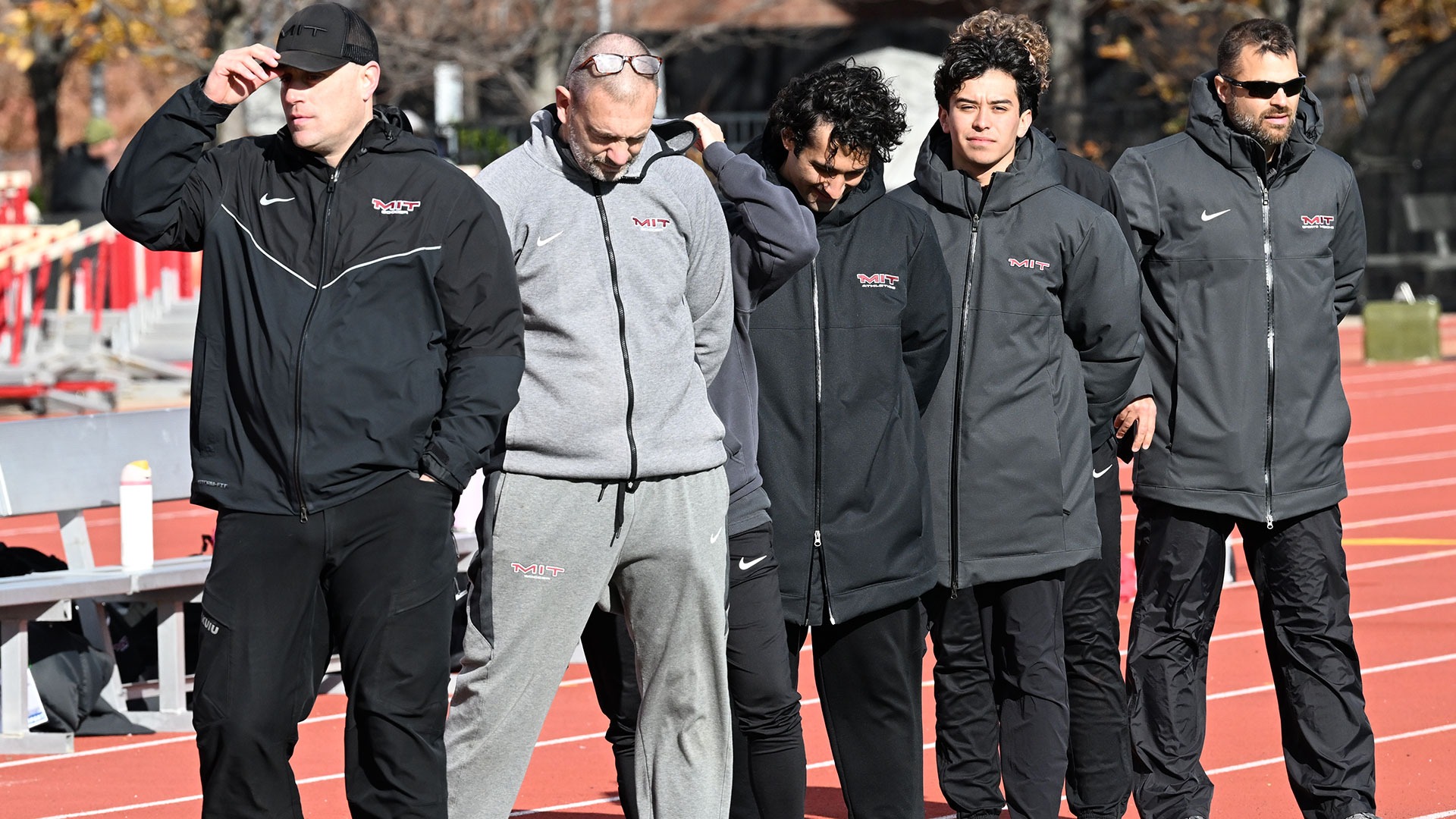 The MIT women's soccer team in a line