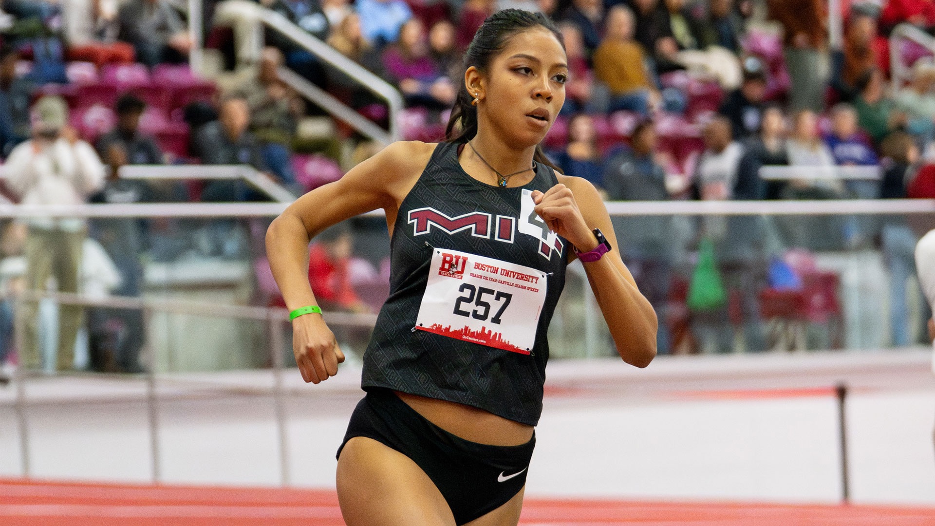 Krystal Montgomery running on a track