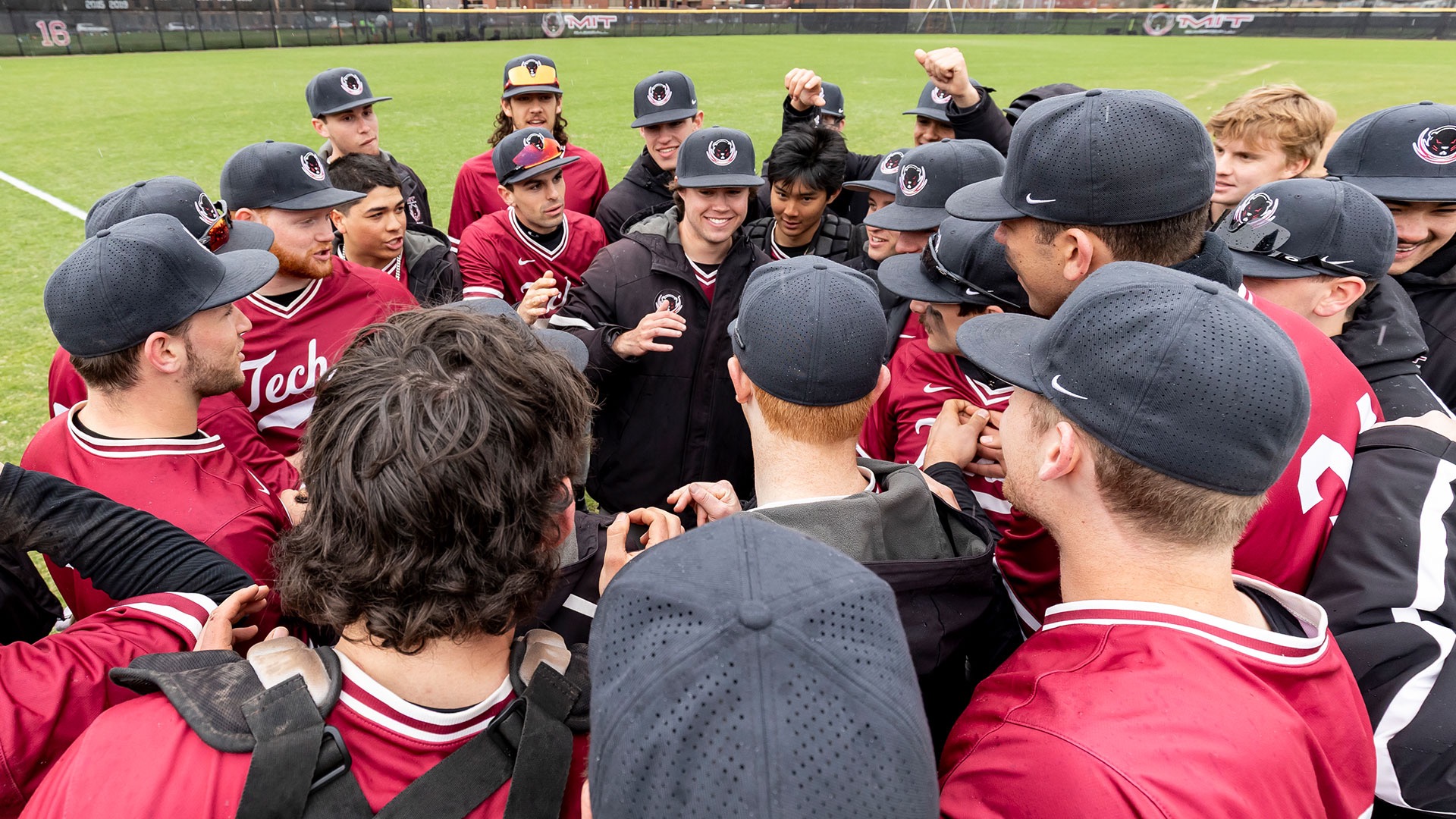MIT baseball team huddle