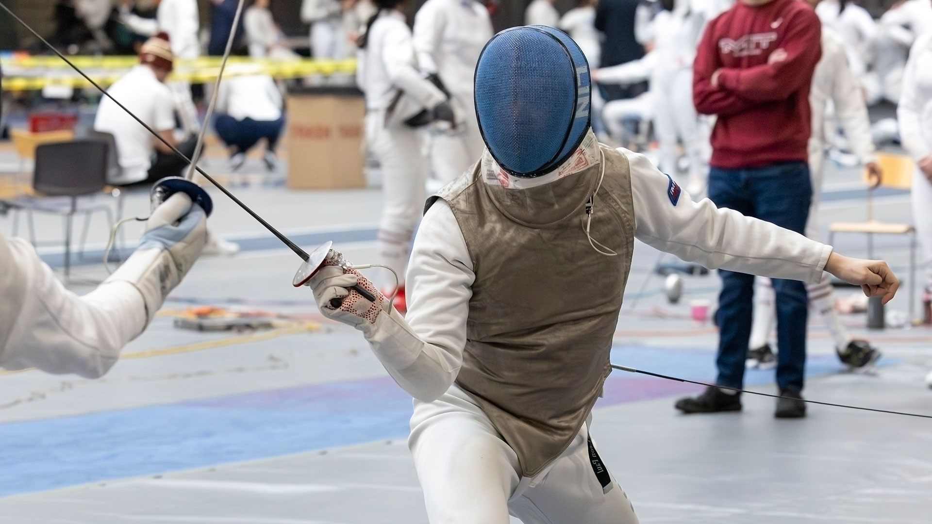 Richard Lin moving towards his opponent