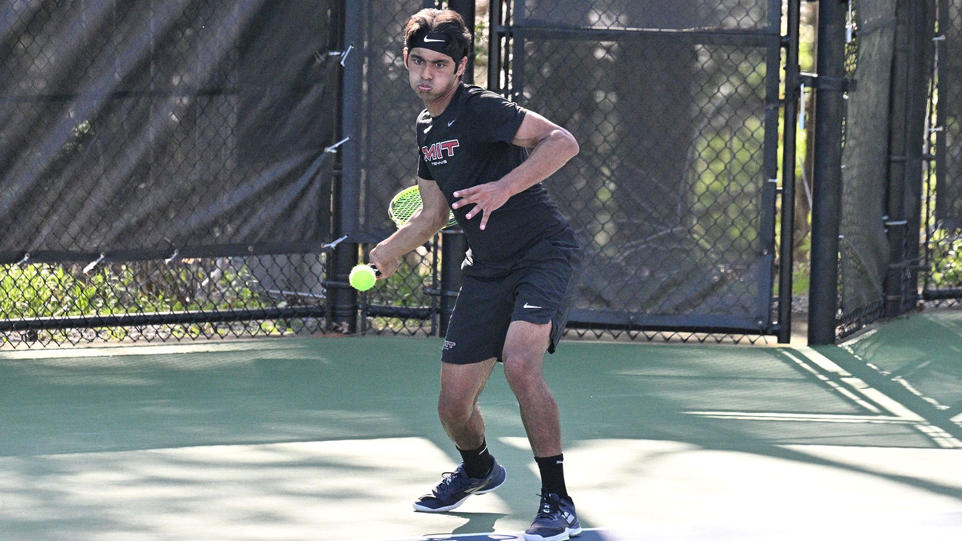 Shrish Choudhary hitting a forehand shot