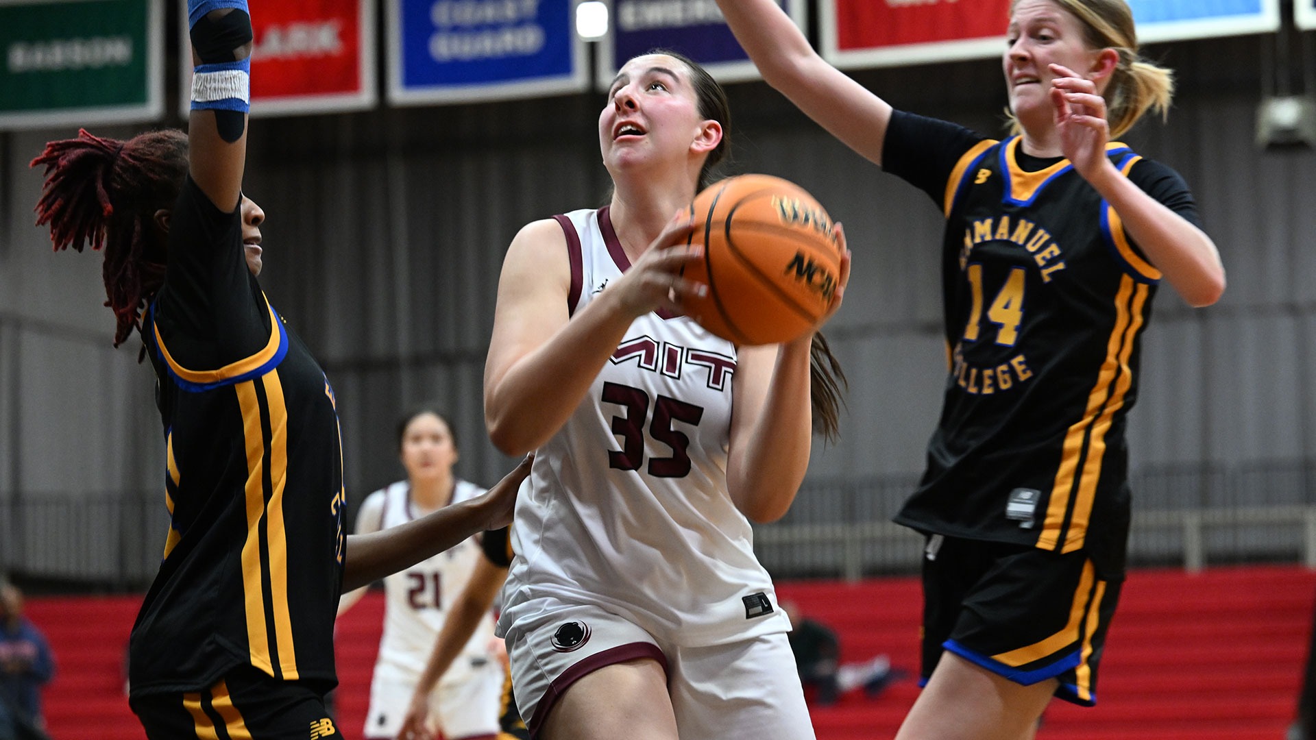 Riley O'Sullivan attempting a shot while being defended