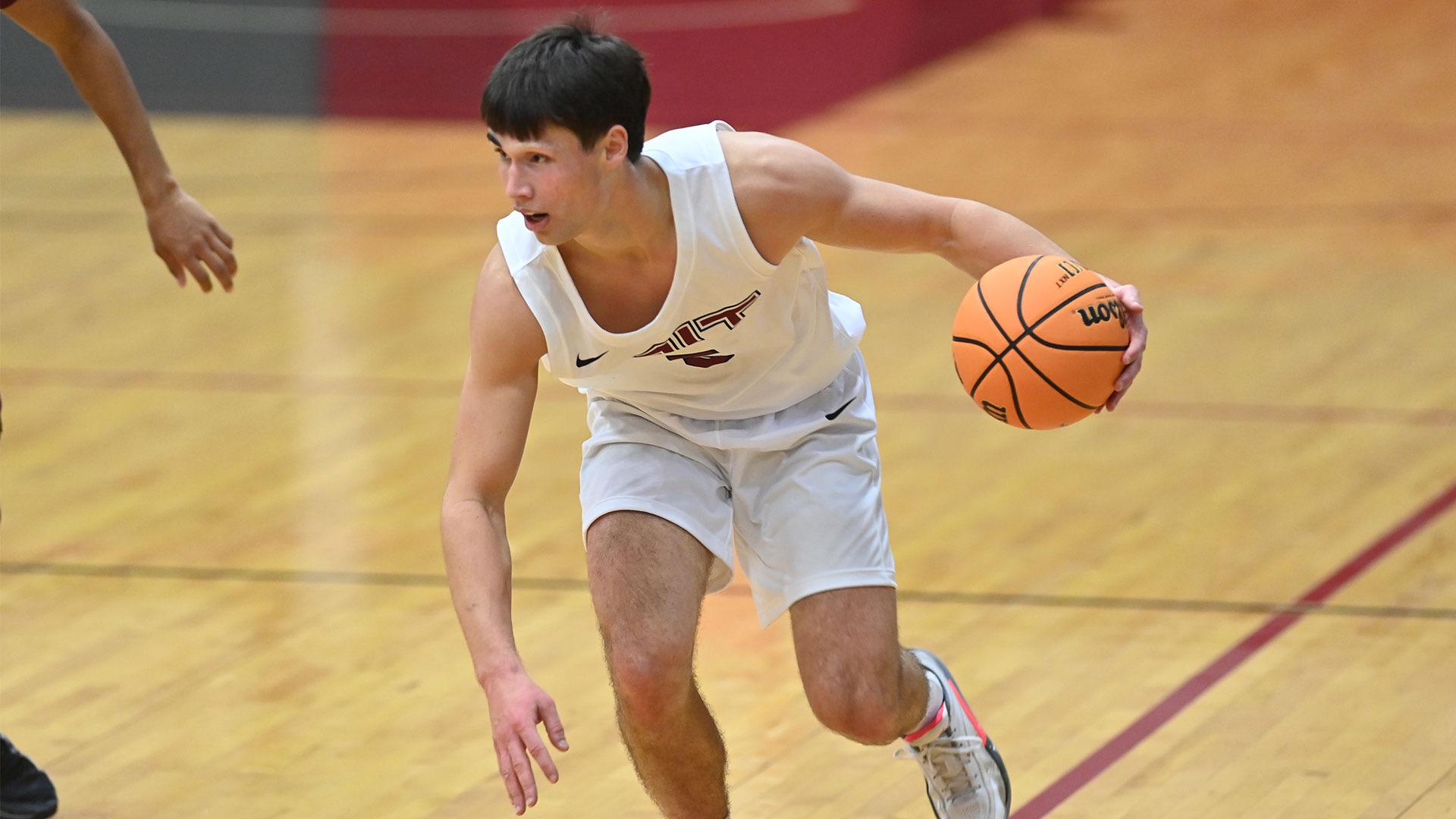 Isaac Dobie dribbles