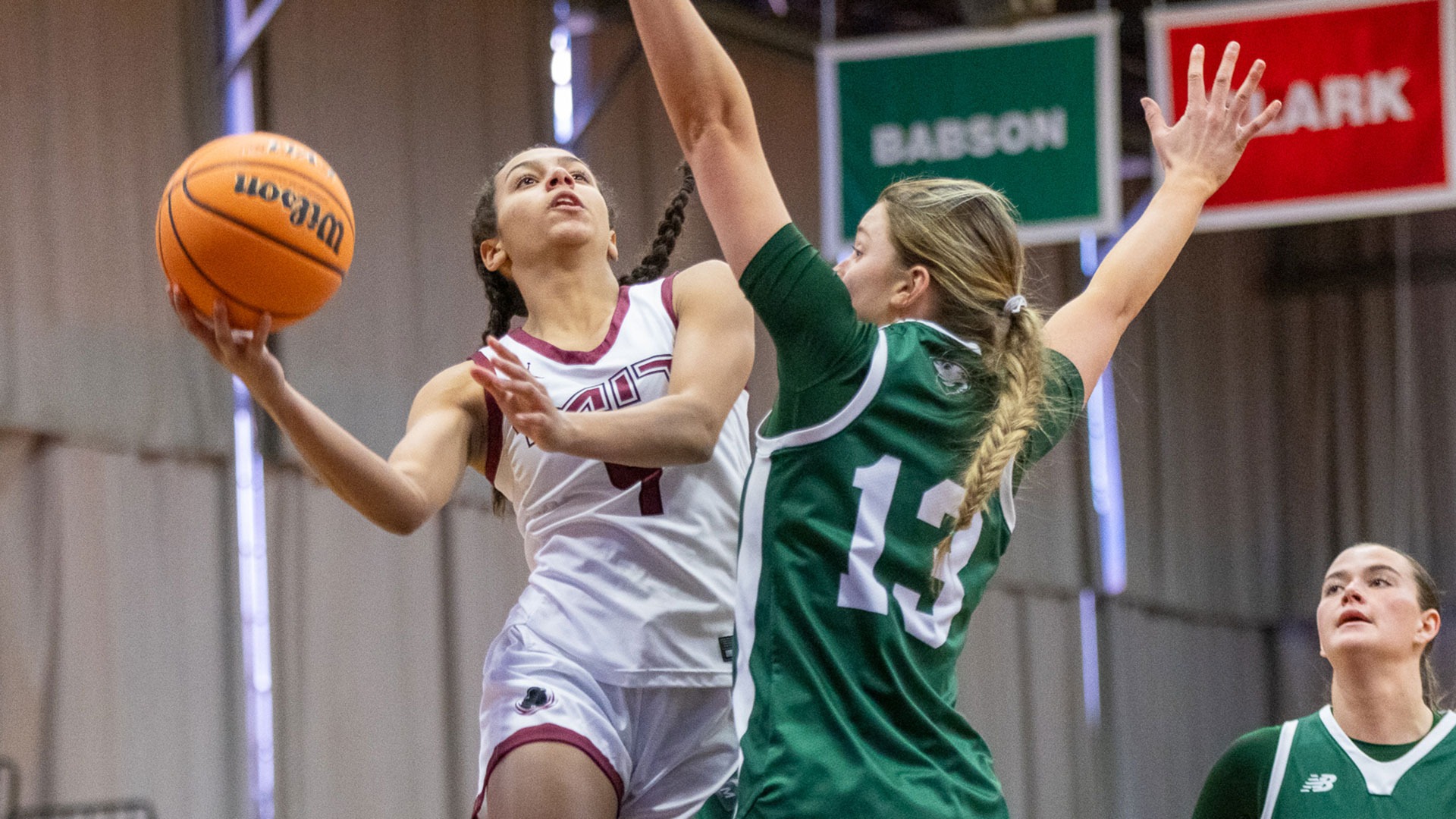 Ruth Lanouette going up for a shot while being defended