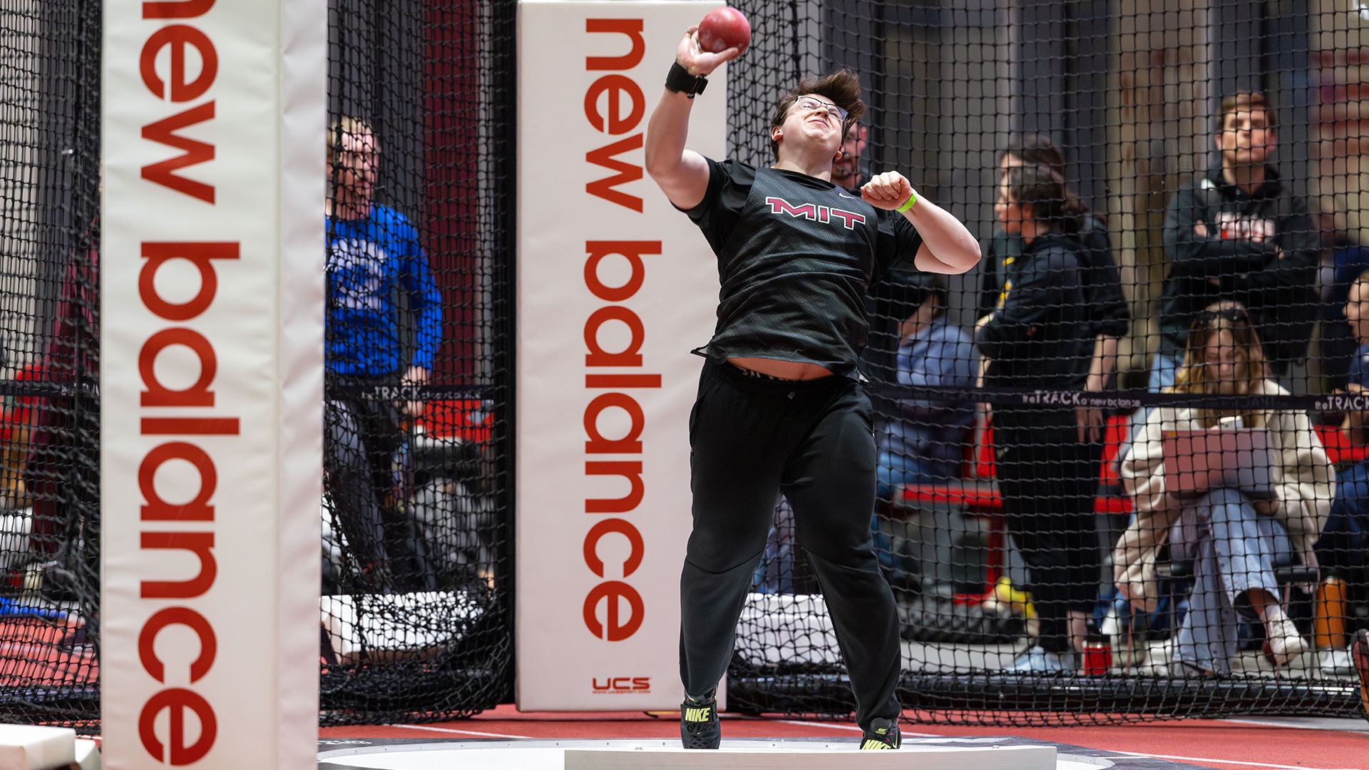 Justin Buonato throws the shot put