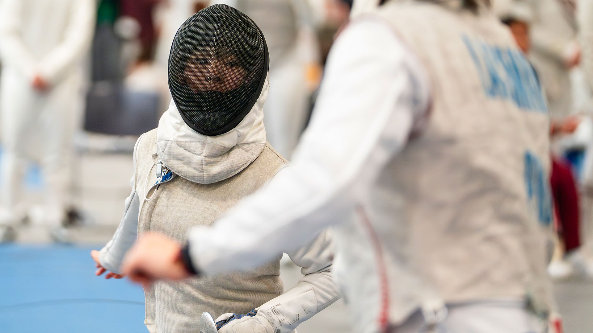 Sandra Luo moving towards her opponent