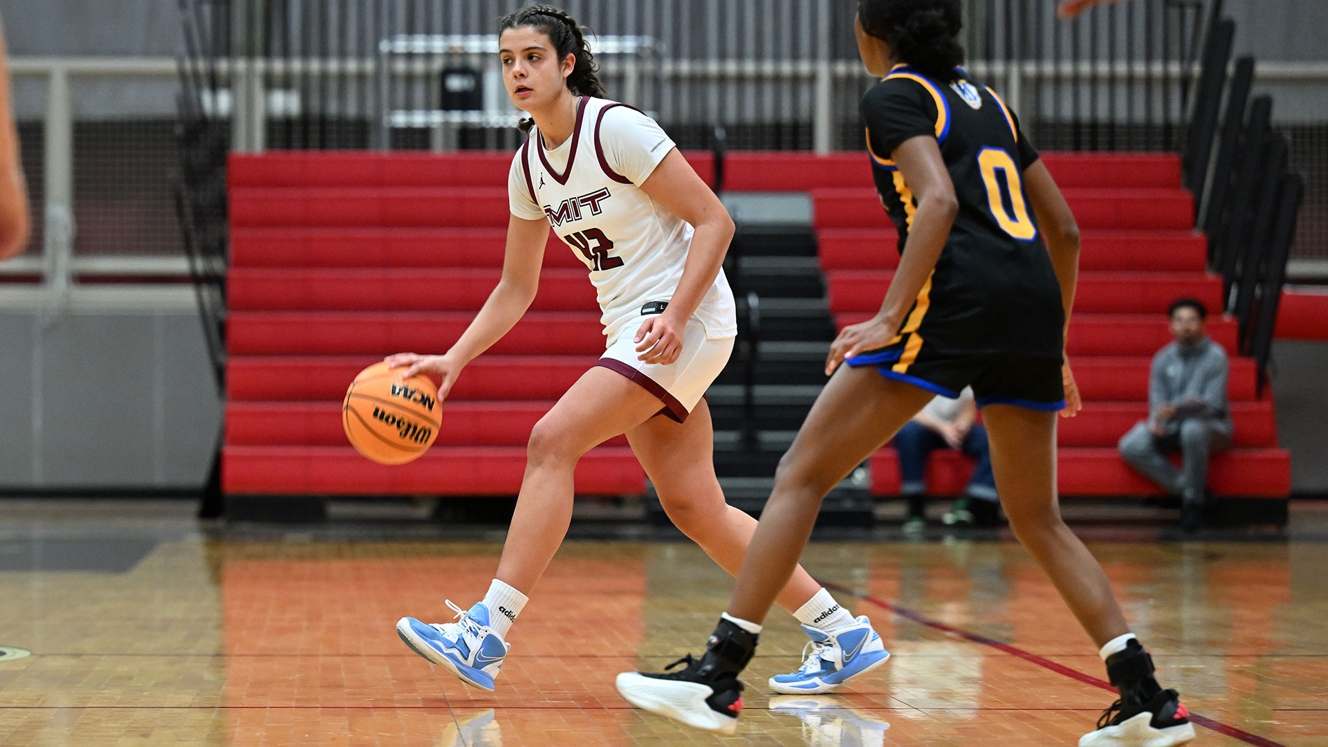 Mary Lobon dribbling a basketball