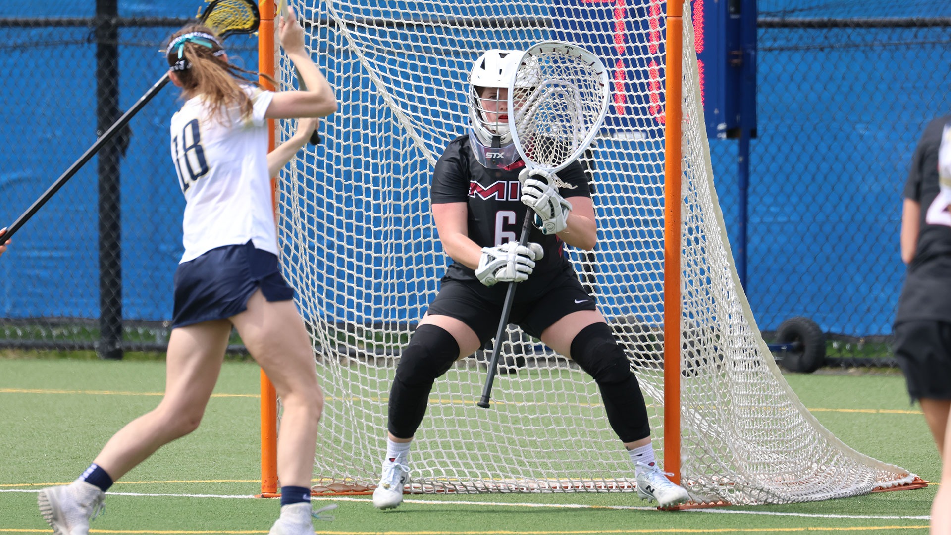 Molly Dulde attempting to make a save