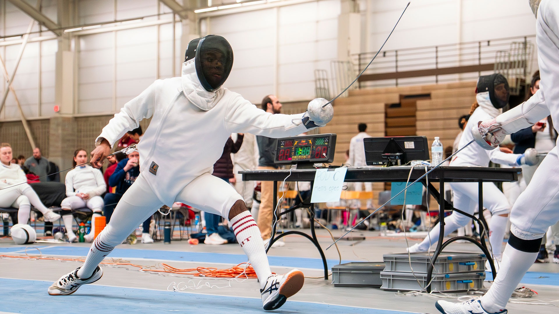 Michael Samuel lunging towards his opponent