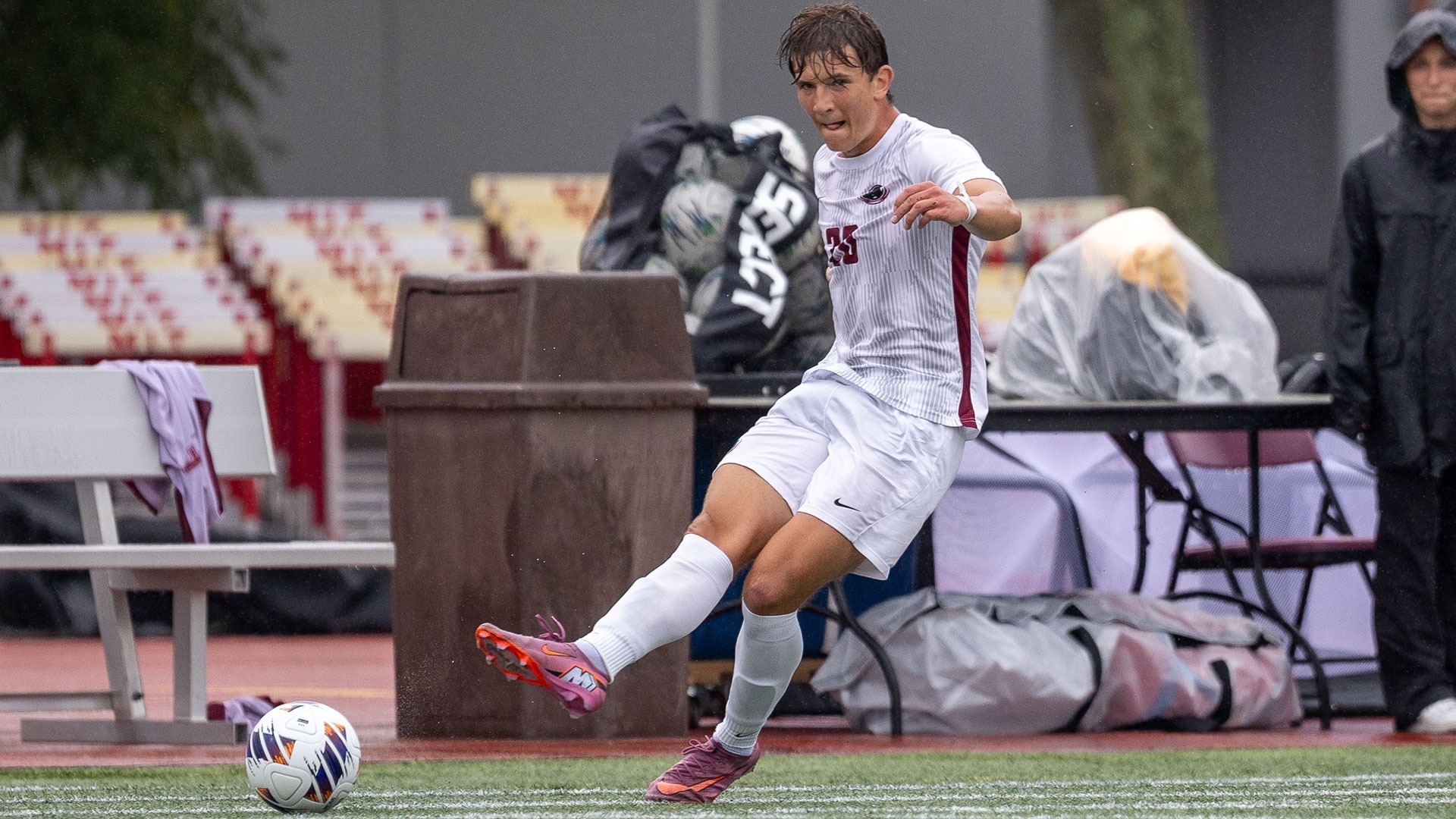 Peter Jedlicka kicking a soccer ball in a game