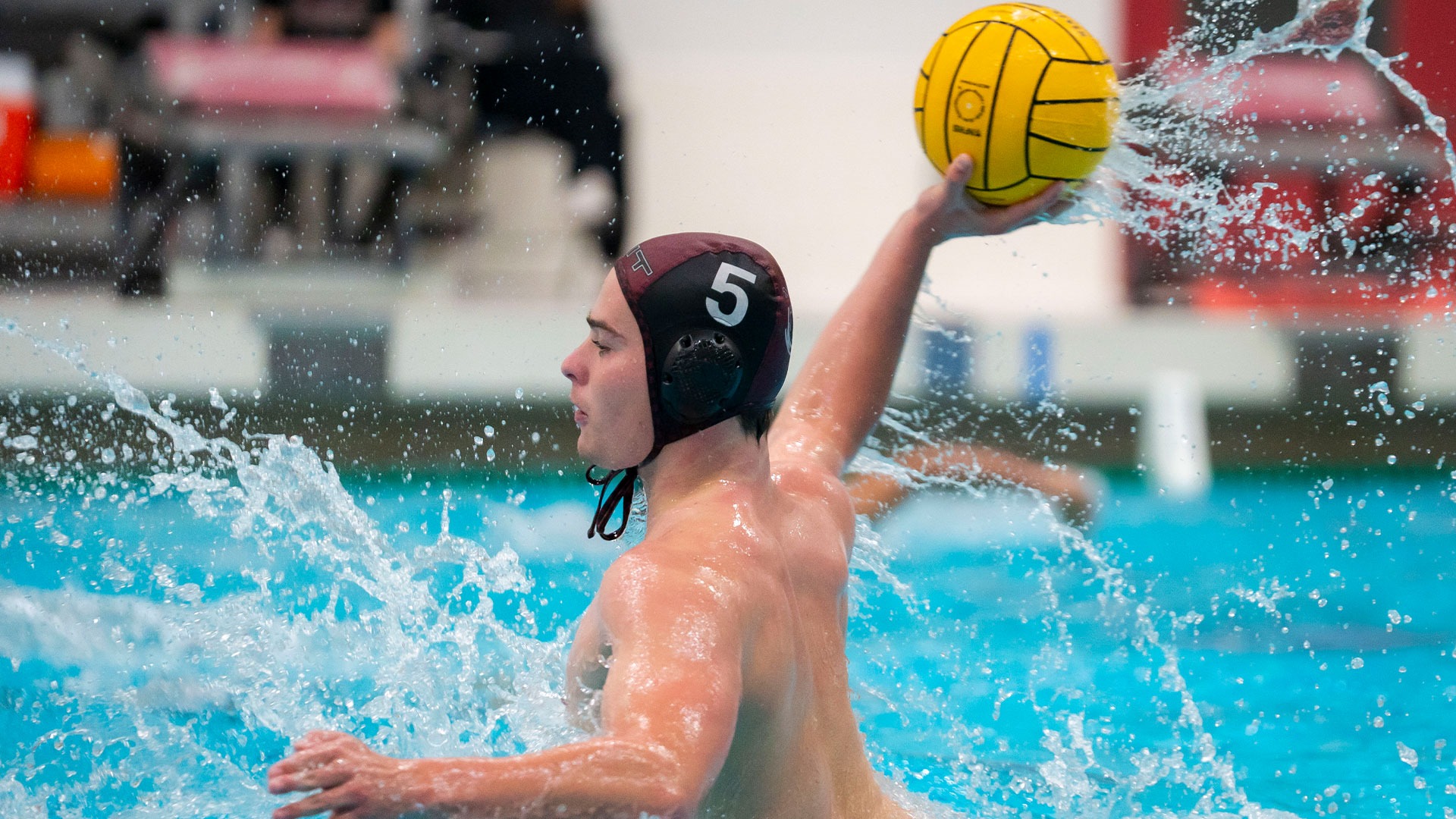 Caspar Lightner holding a water polo ball