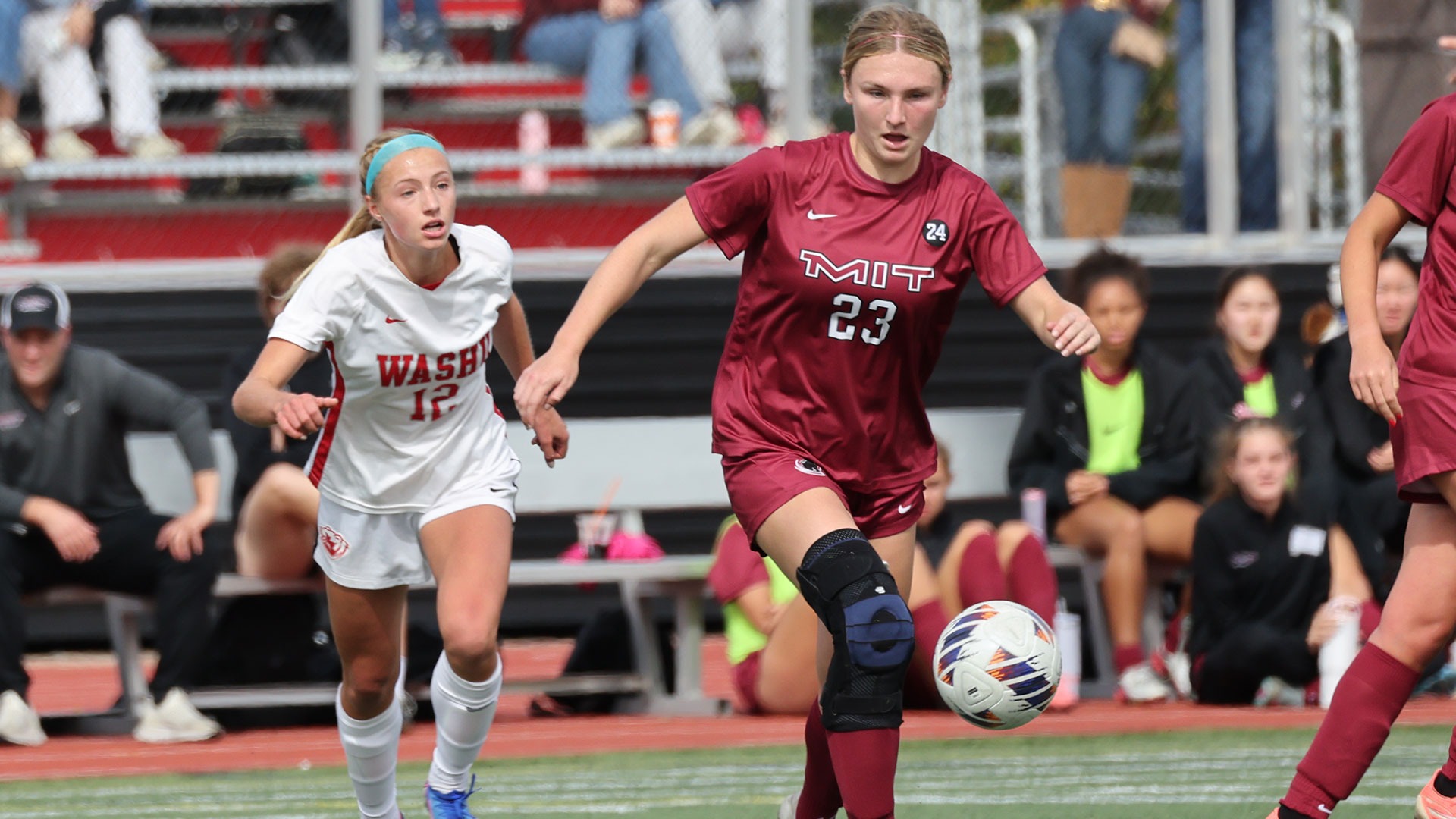 Maddie Popilek running though a defense 