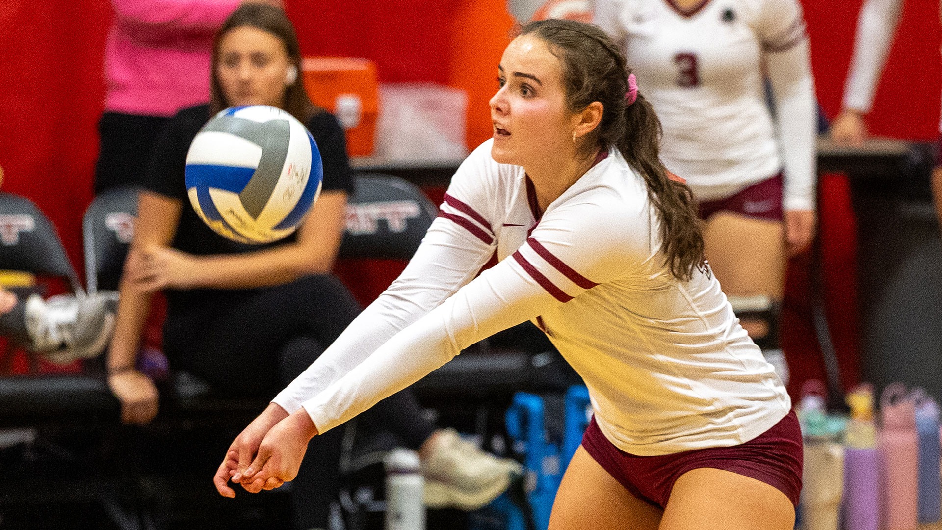 Julia Tolstova digging a volleyball