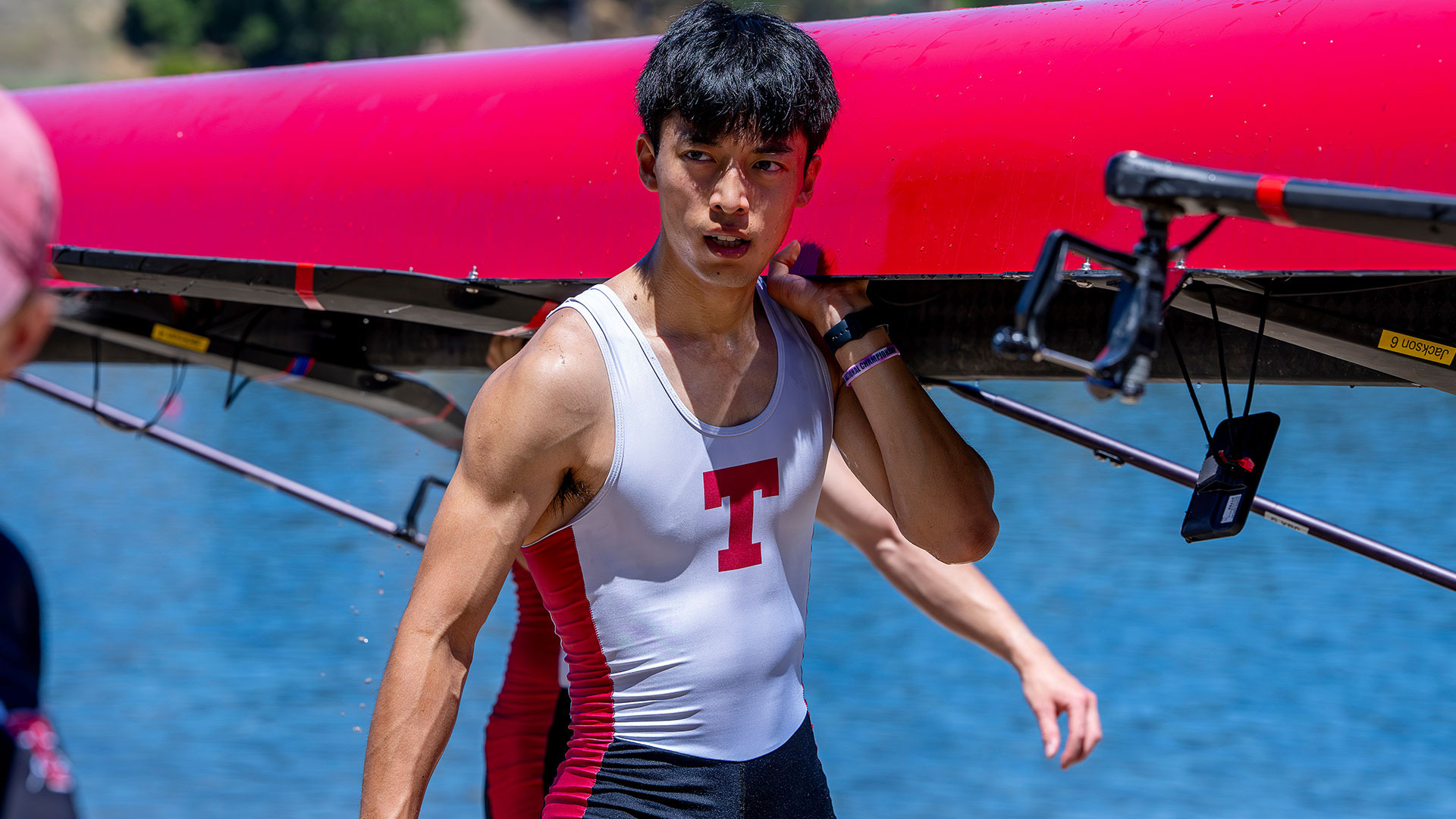 Ryosei Tanakamaru carrying a crew shell