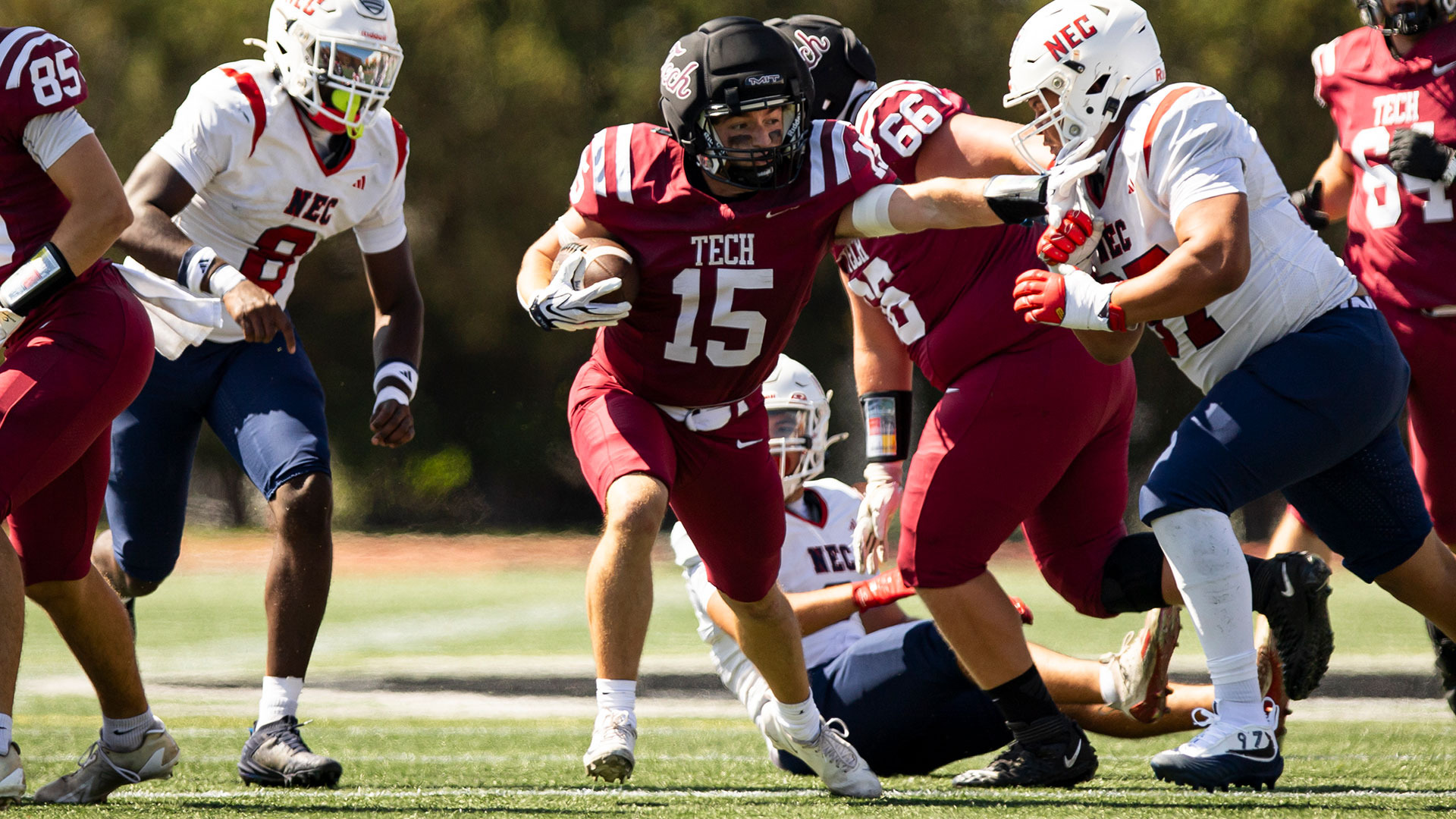 Brendan Spellman rushing through the line with the football