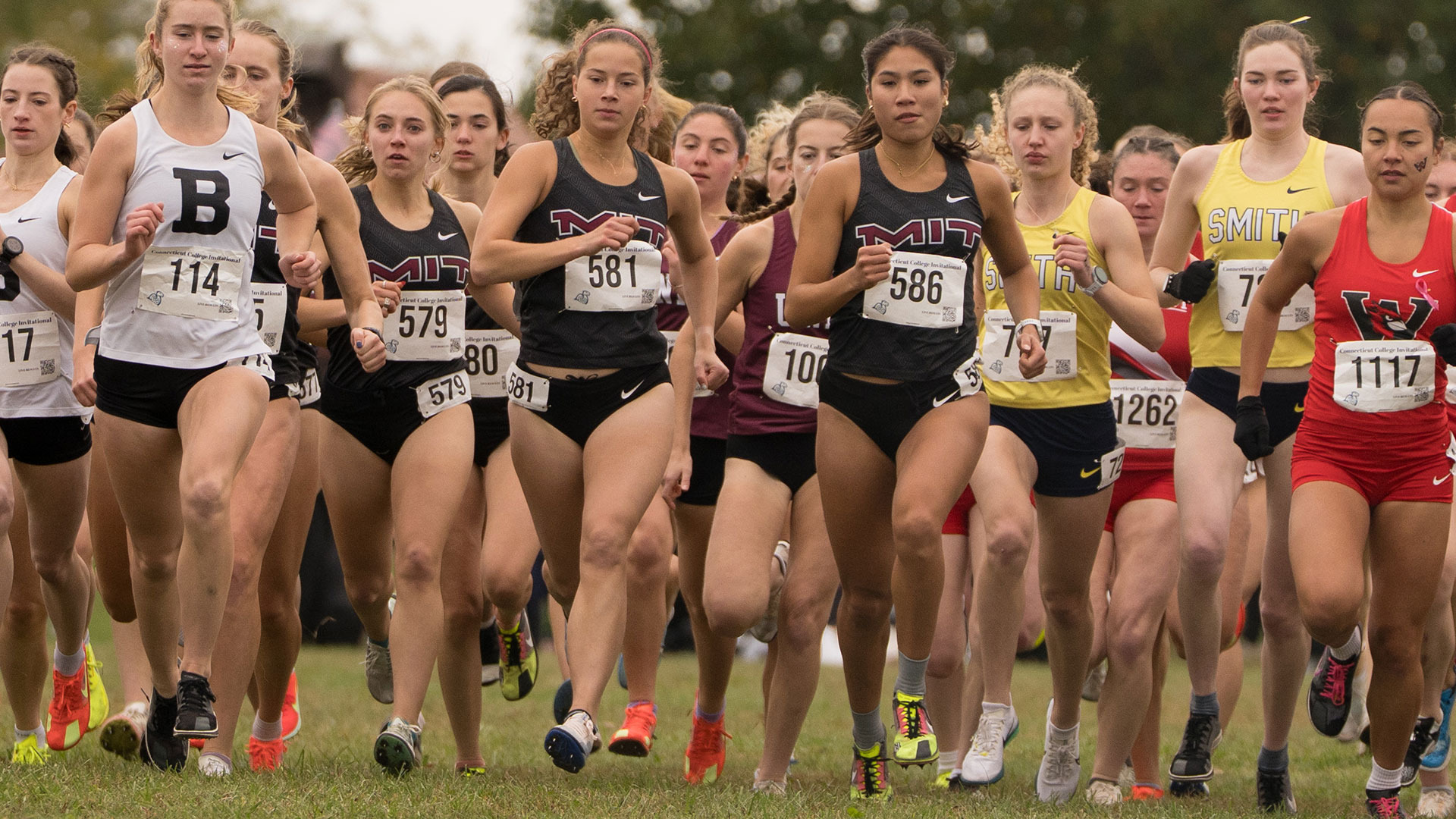 Liv Girand and Jordan Lacsamana running in a pack