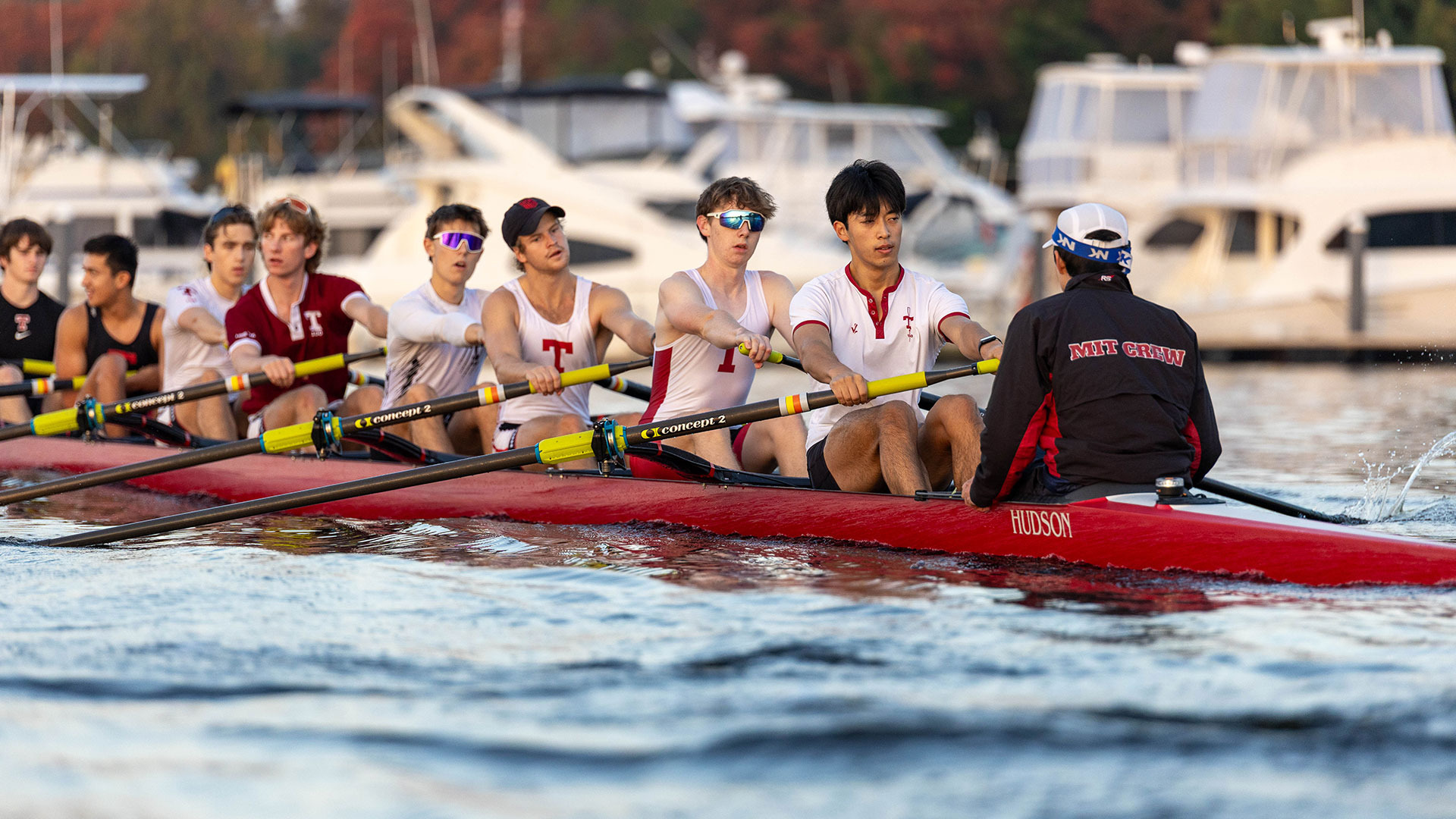 MIT men's lightweight crew varsity eight rowing on the Charles River