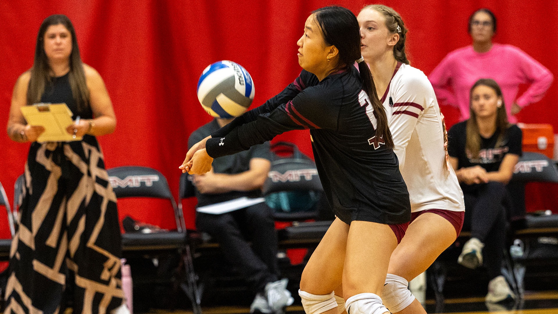 Sophia Song digging a volleyball