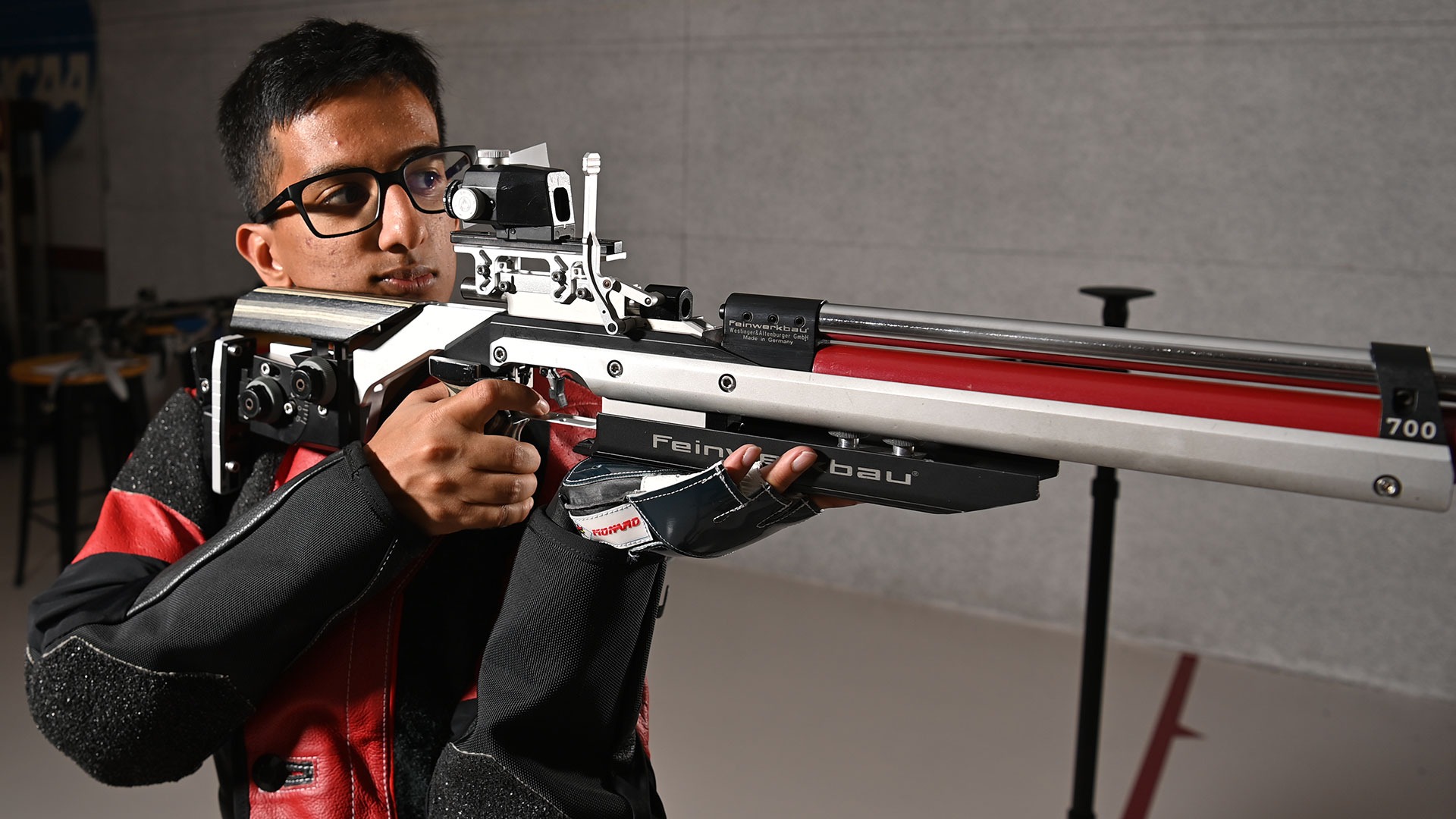 Avaneesh Pal aiming his rifle down range