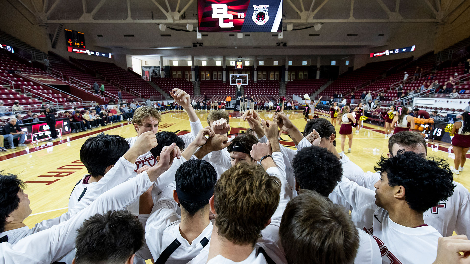 Men's basketball pre-game huddle