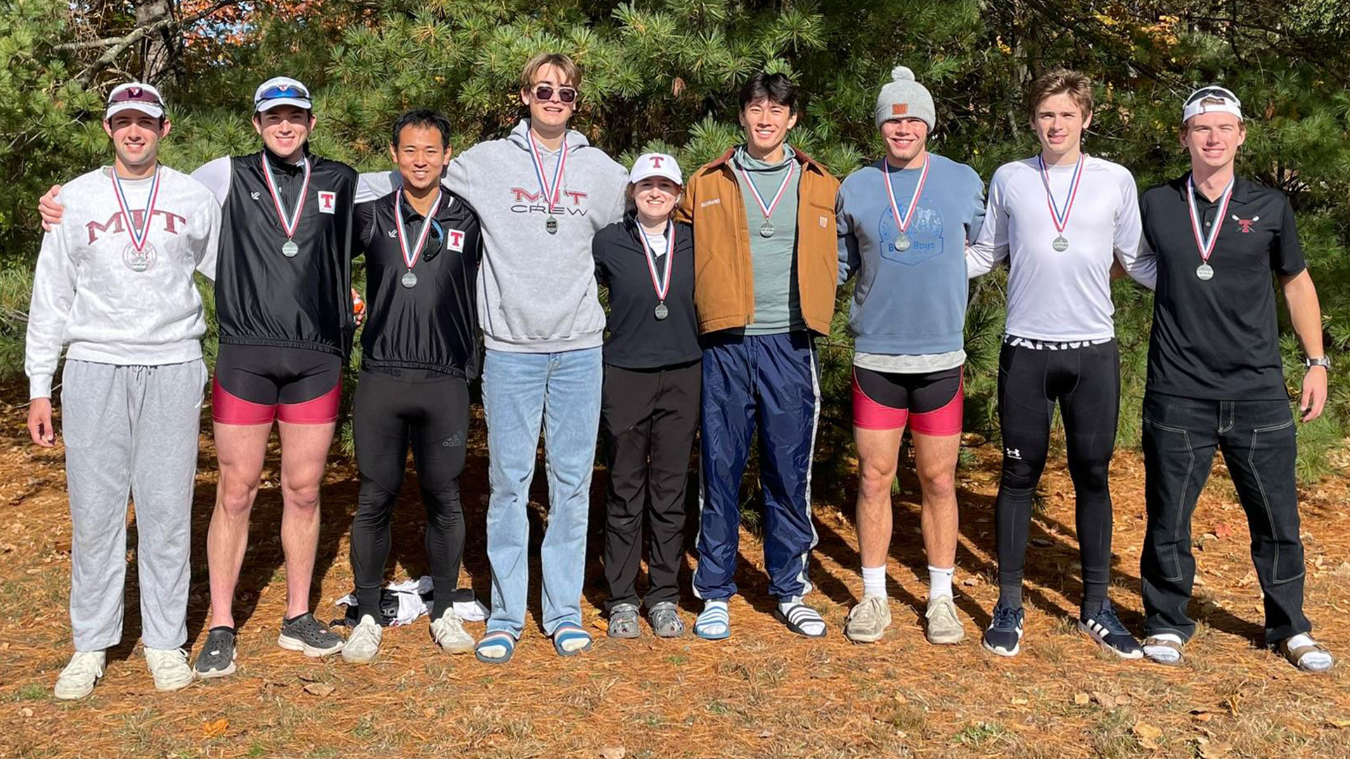 MIT men's varsity eight with silver medals
