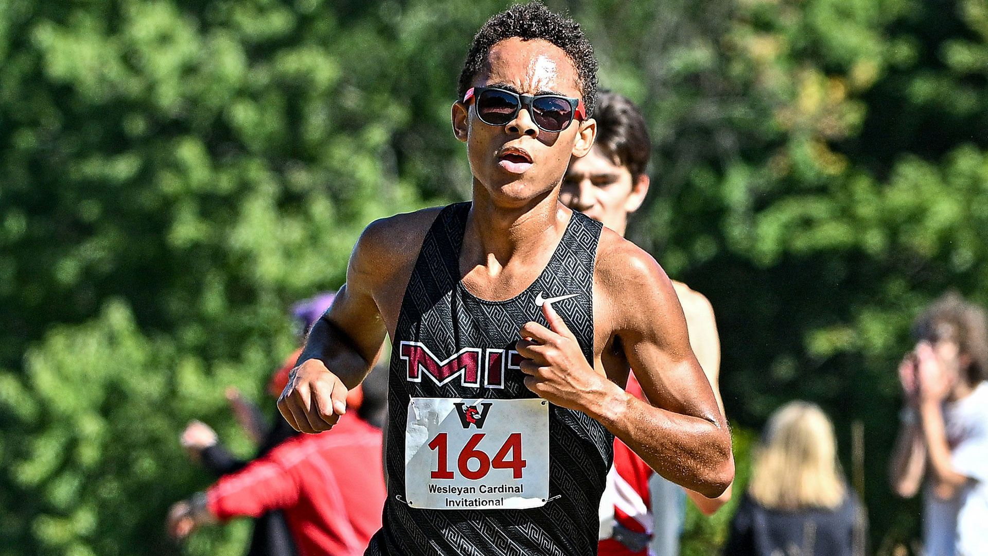 Renee Cooper running in sunglasses for MIT