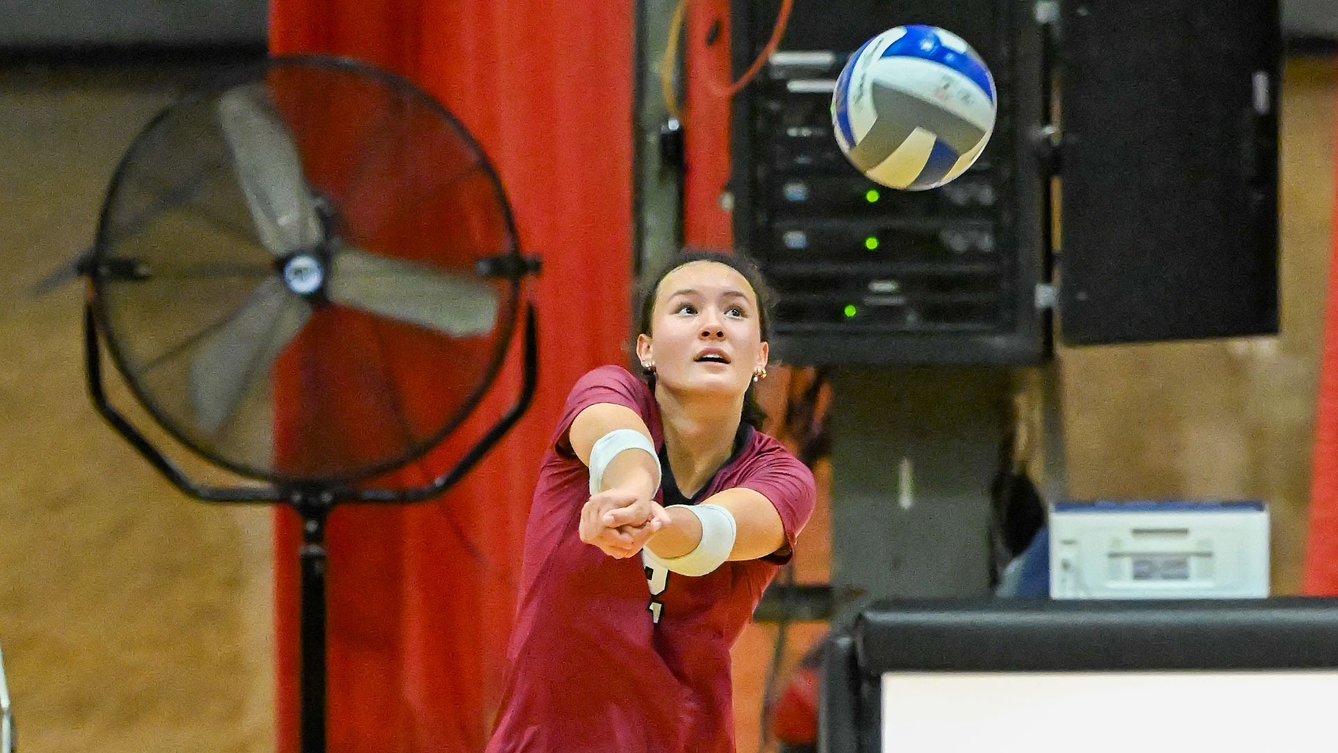 Sabine Smith digging the volleyball