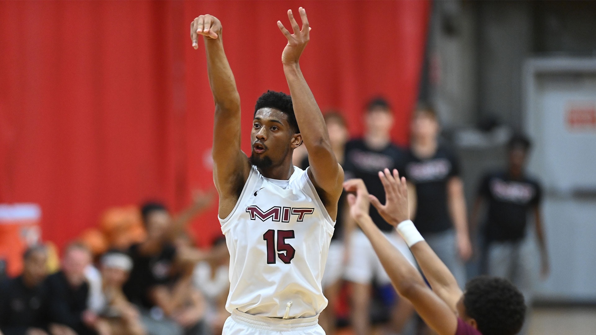 Mike Ewing shooting a jump shot