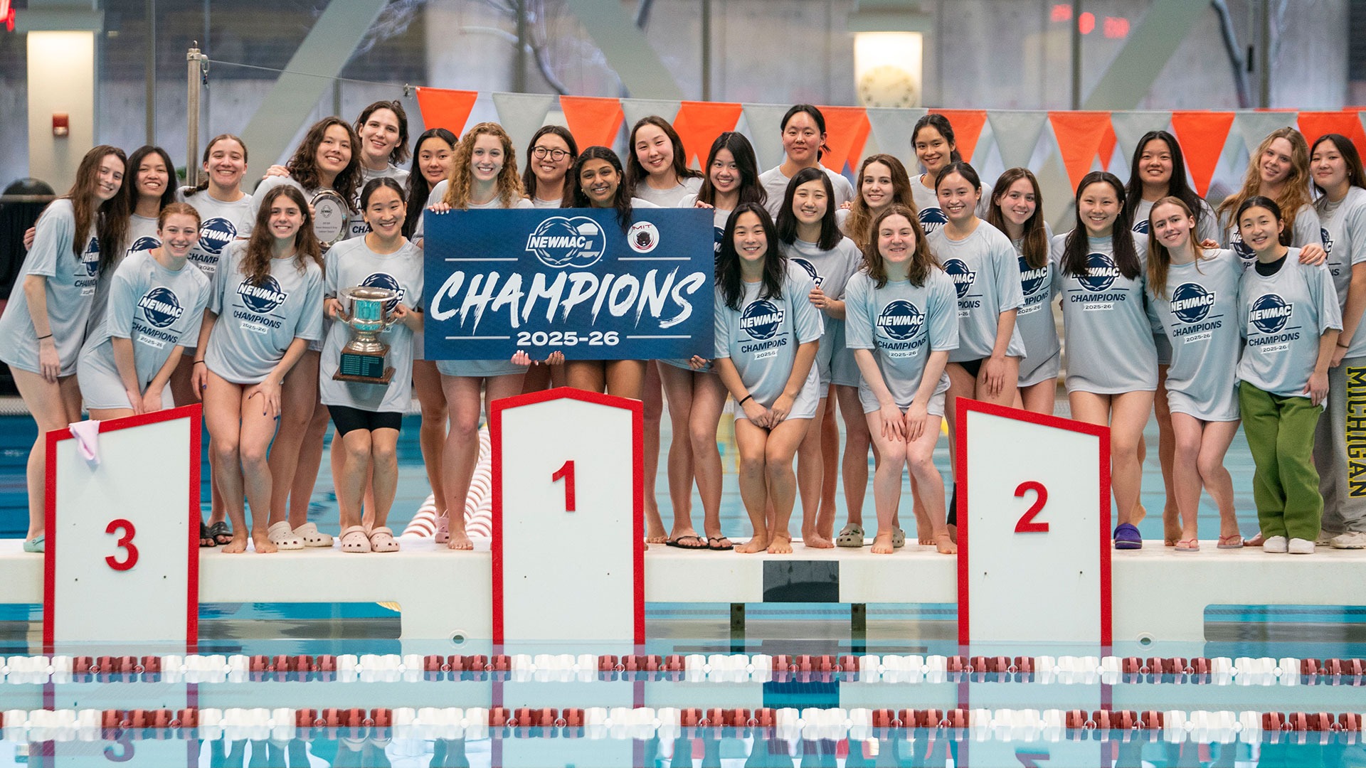 The 2026 Women's Swim and Dive NEWMAC Championship Team Photo