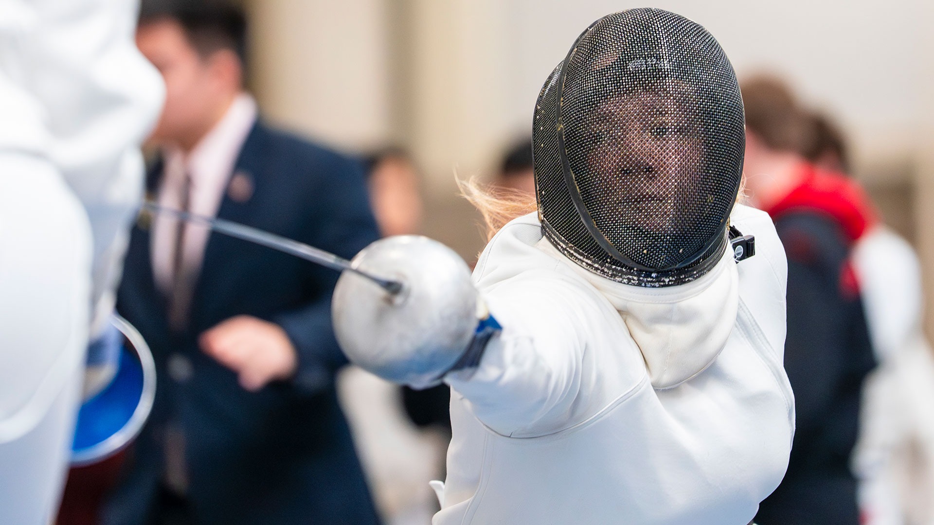 Hannah Beaver lunging towards her opponent